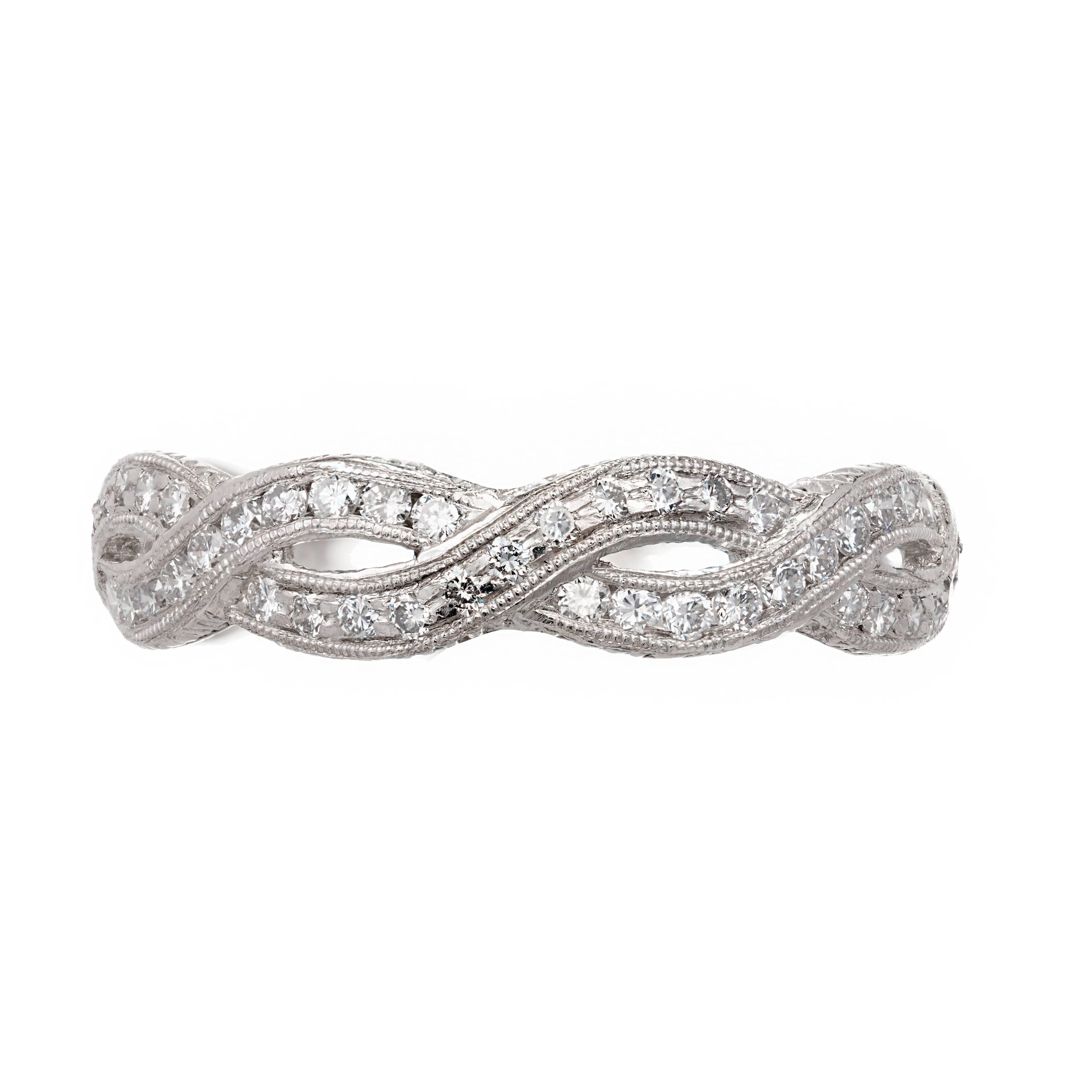 Peter Suchy vintage inspired platinum infinity style two row pave set and engraved eternity ring with bright full cut diamond. Can be made to fit any size.

88 round diamonds full cut VS approximate .60 carats
Size 5 ¼ 
Platinum
Tested: Platinum
3.2