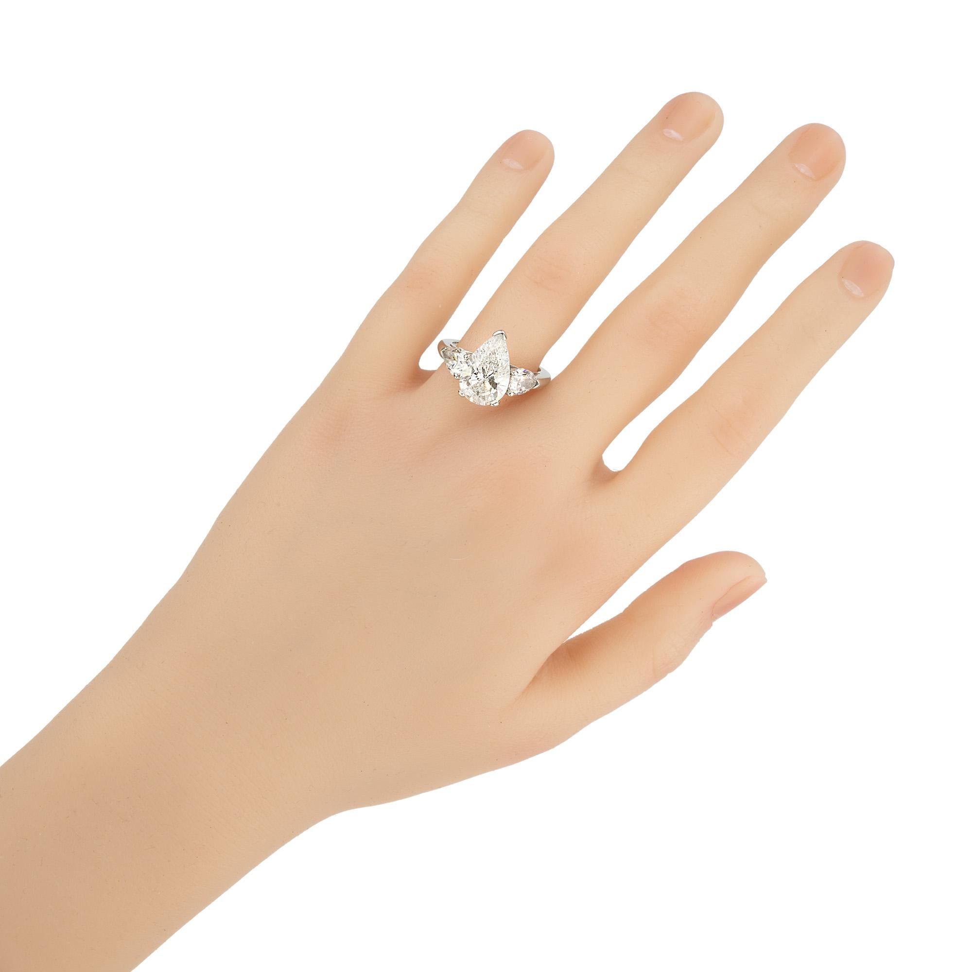 Peter Suchy EGL 4.02 Carat Pear Diamond Platinum Three Stone Engagement Ring For Sale 3