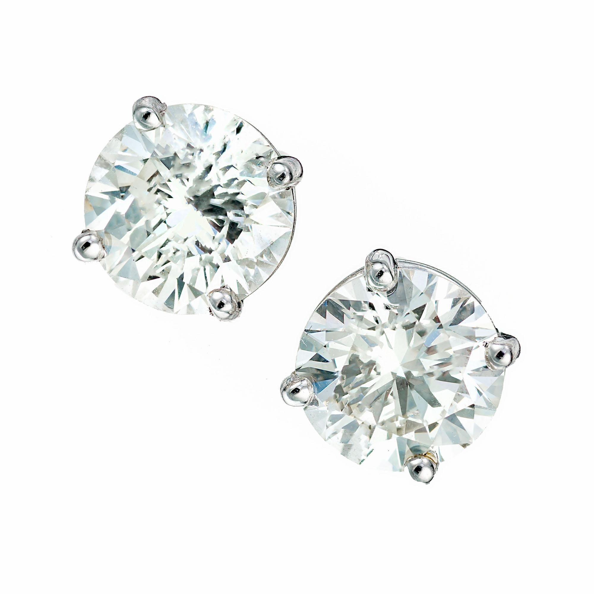 Round brilliant cut stud earrings. 2 EGL certified diamonds in simple platinum baskets. Designed and crafted in the Peter Suchy workshop.

1 round brilliant cut diamond, J-K VS2 approx..89cts EGL Certificate # 400148927D
1 round brilliant cut
