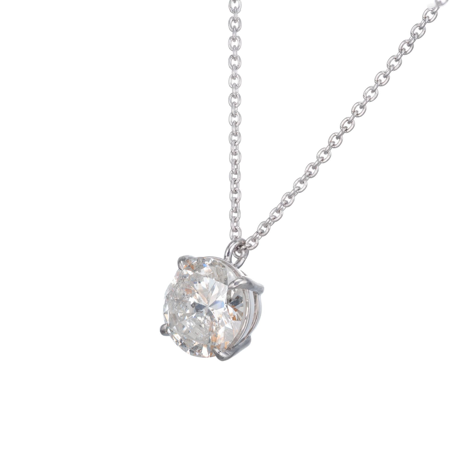 Large round brilliant cut 6.70 carat diamond set in a four prong platinum basket setting as pendant from an 18 Inch platinum chain with an adjustment ring at 16 Inches. 

1 round brilliant cut diamond H-I I2, approx. 6.72ct EGL Certificate # US