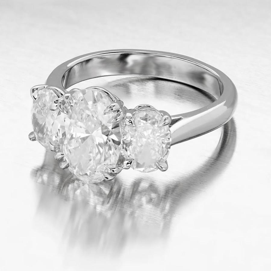 Peter Suchy GIA 2.01 Carat Oval Diamond Platinum Three-Stone Engagement Ring For Sale 3