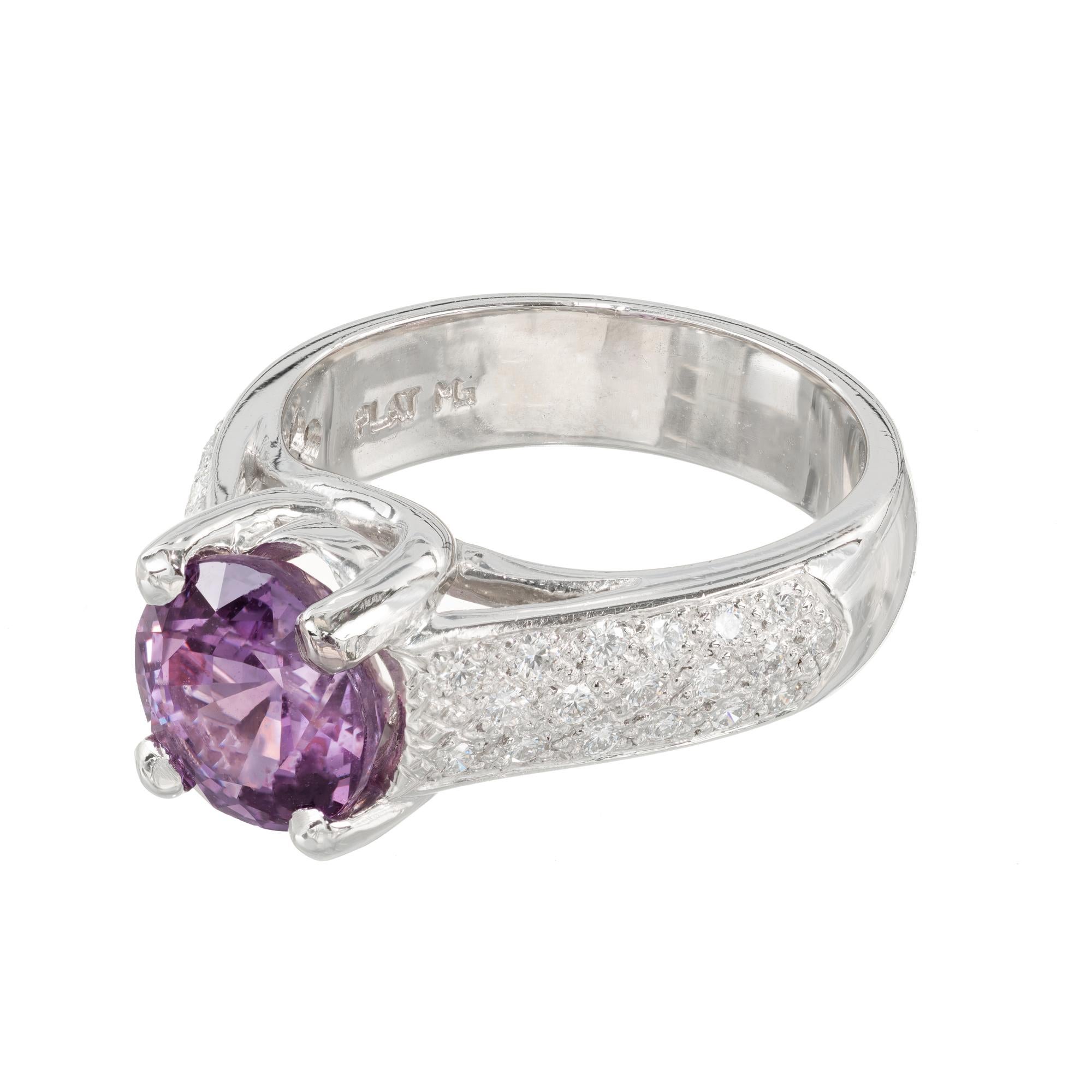 Purple sapphire and diamond engagement ring. GIA certified Fancy color natural no heat, no enhancement center Sapphire stone with pave set accent diamonds in a platinum setting. Designed and crafted in the Peter Suchy Jewelers Workshop. 

1 Bright