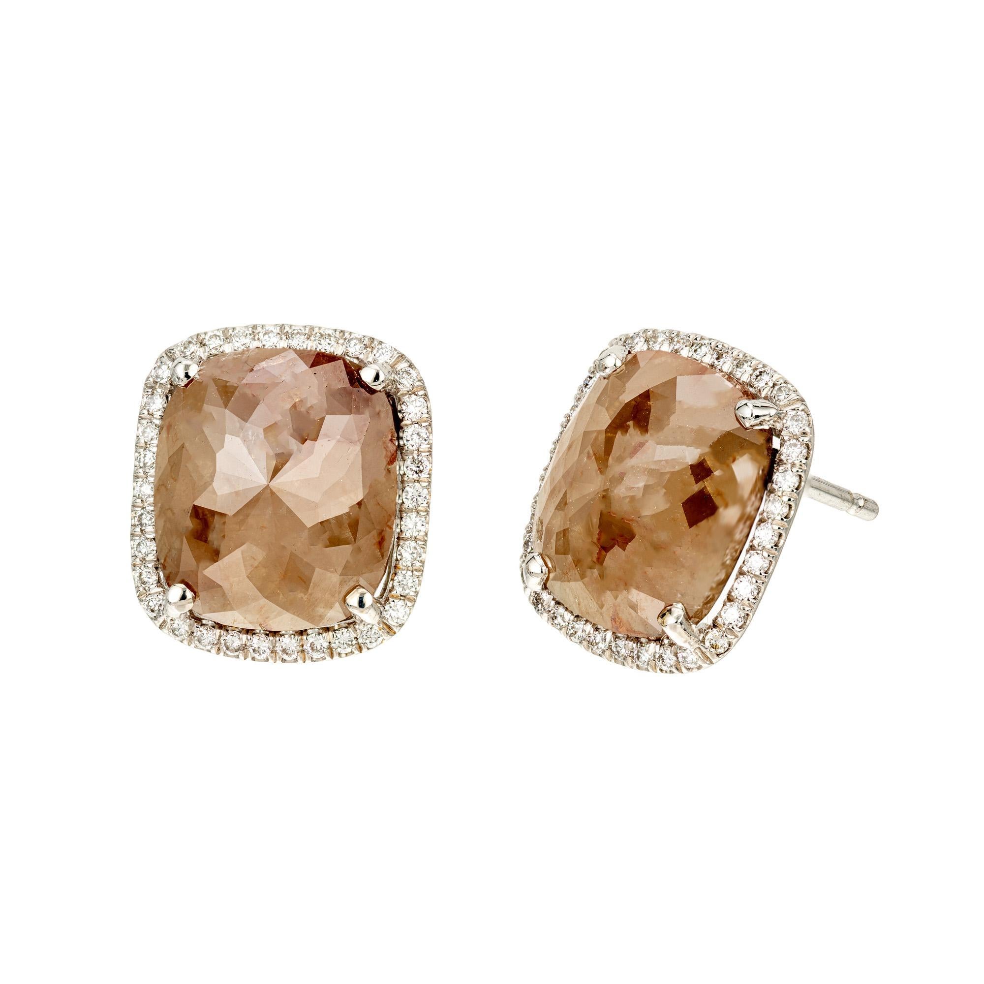 Peter Suchy natural fancy yellow brown Diamond halo earrings. Set with two rose cut diamonds which are set in 18k white gold. Both diamonds are each framed with a 34 round full cut diamond halos. Each diamond is certified by the GIA separately. 

1