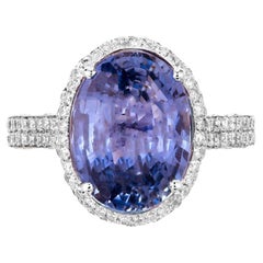 Verlobungsring mit 6,46 Karat blauem Saphir und Diamant-Halo aus Gold