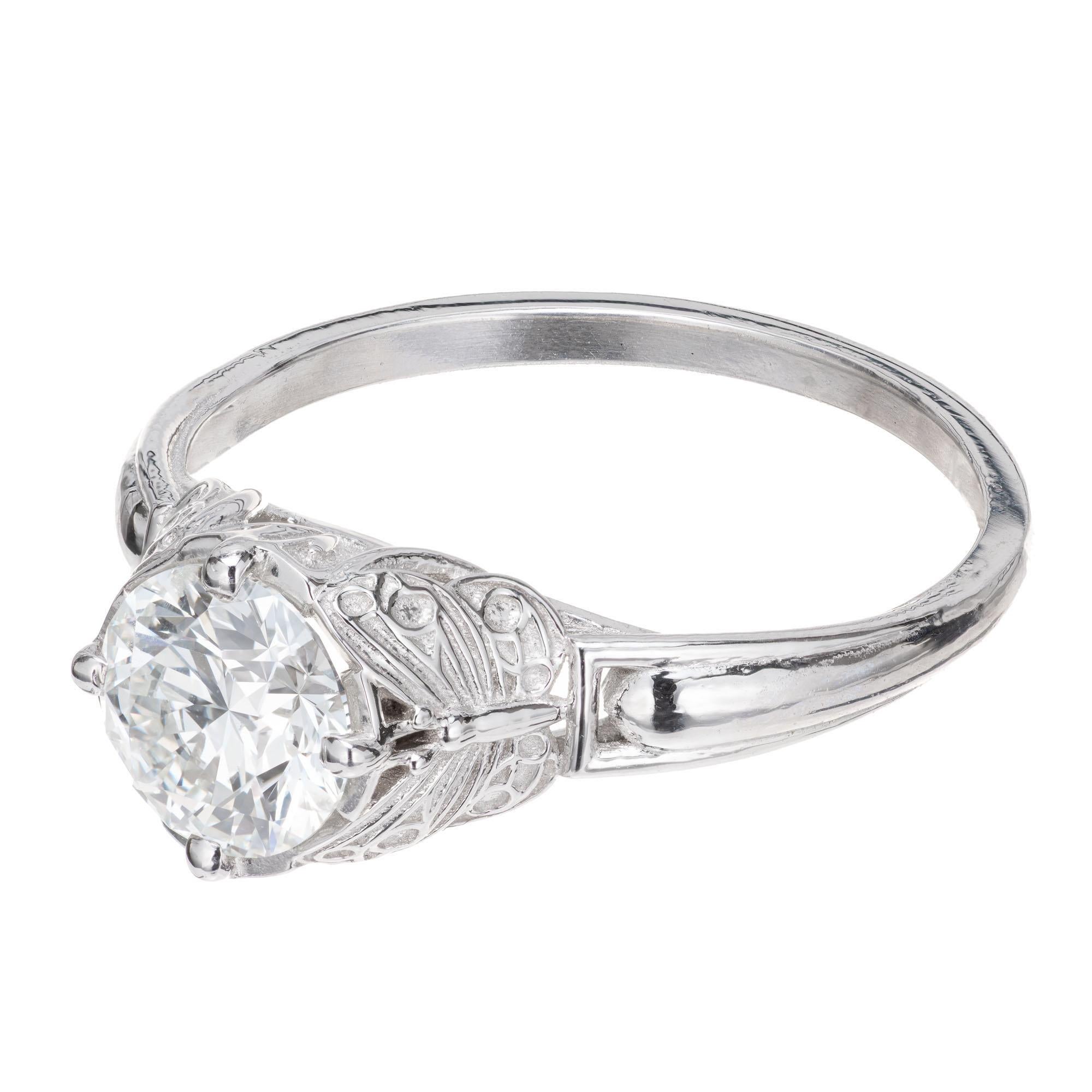 Ideal cut GIA certified 1.00ct diamond engagement ring. GIA certified center diamond in a platinum setting, designed an crafted in the Peter Suchy Workshop. 

1 round brilliant cut diamond G SI2, approx. 1.00ct GIA Certificate # 17433878
Size 6.5
