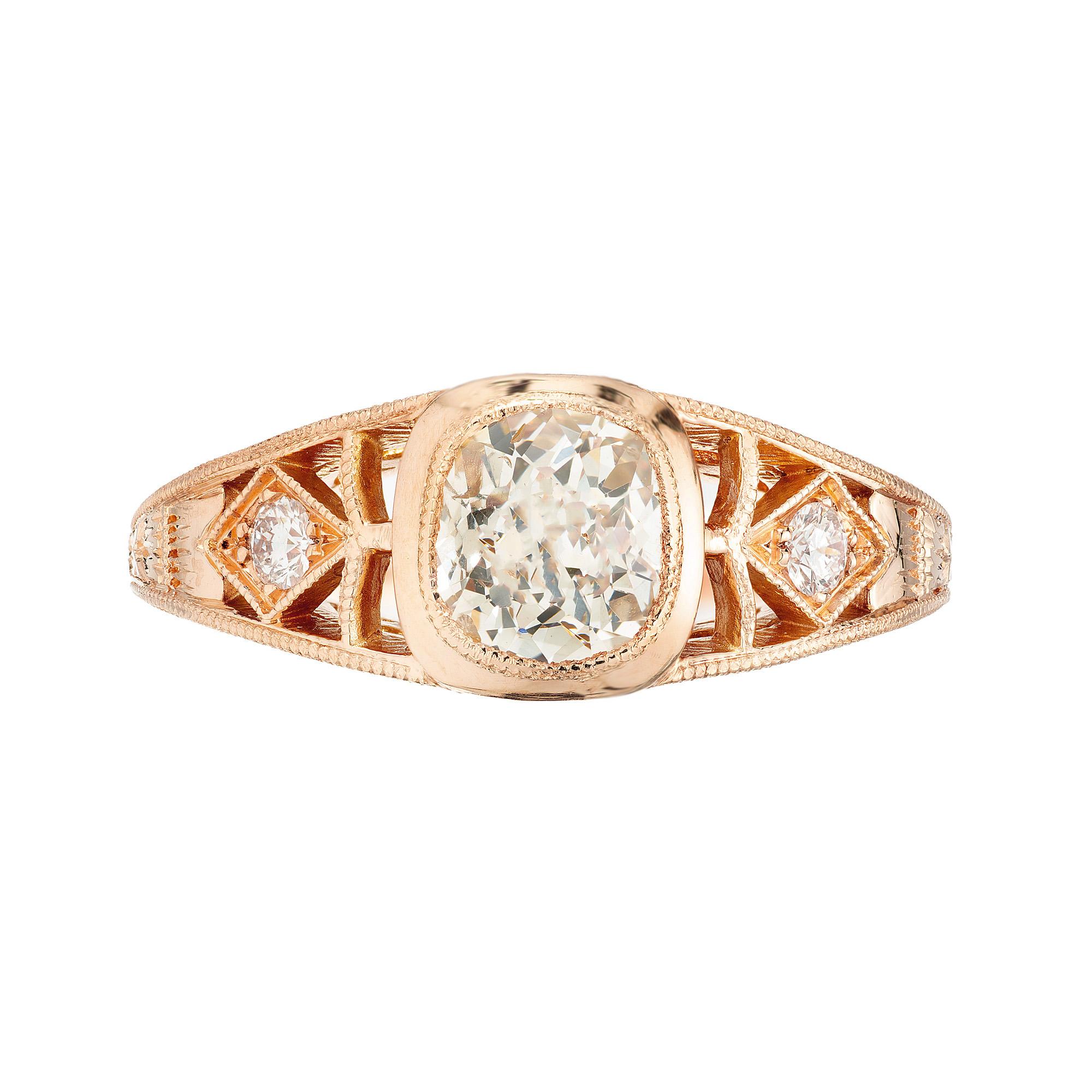 The Peter Suchy GIA certified 1.00ct Old Mine Diamond 18k Rose Gold Engagement Ring is a timeless masterpiece, a celebration of love captured in a beautifully crafted design. This exquisite ring features a 1.00 carat old mine diamond that is