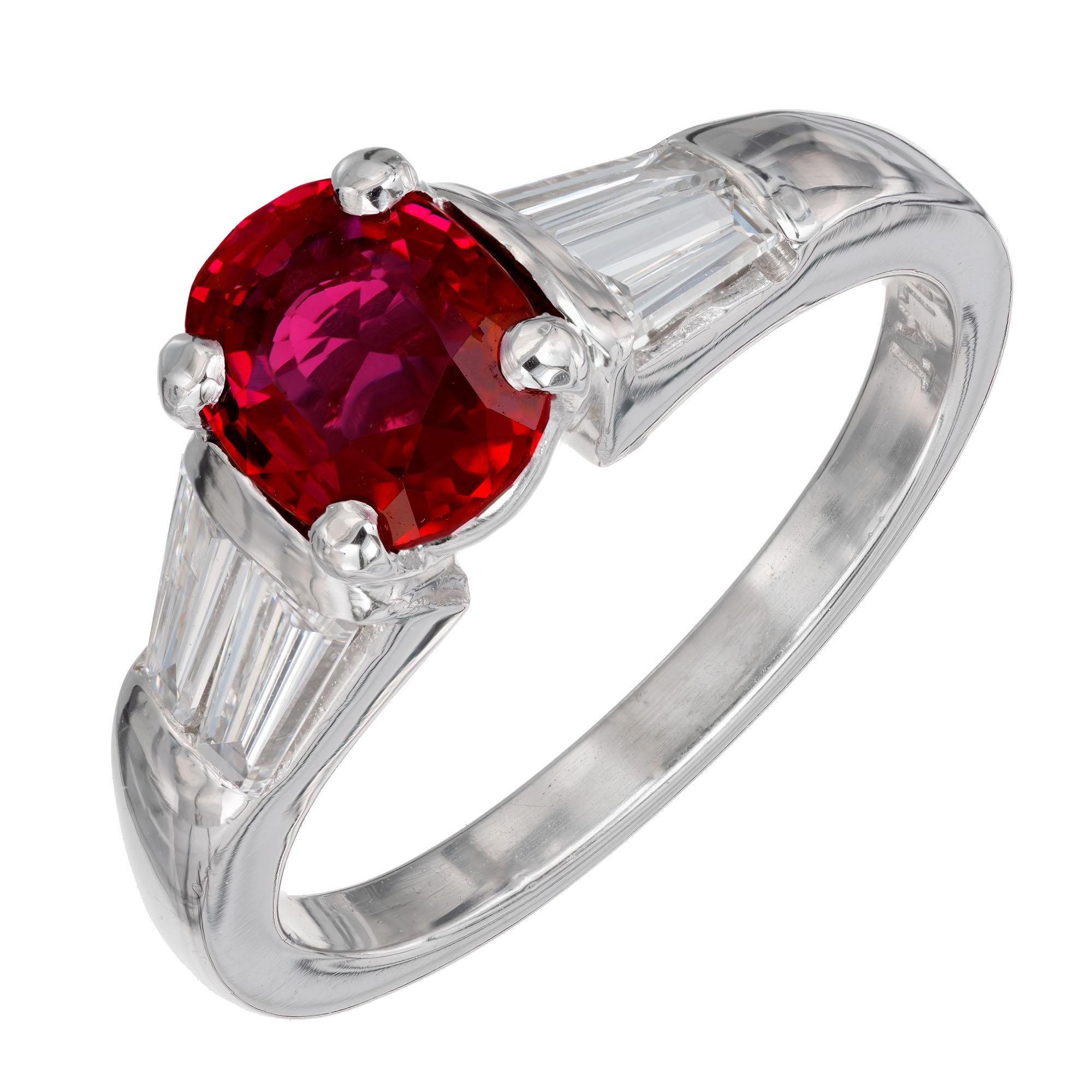 Natural no heat GIA certified oval 1.10 carat ruby and diamond engagement ring. Oval ruby center stone accented with 4 tapered baguette side diamonds, in a platinum setting, created by the Peter Suchy Workshop. 

1 oval red ruby, approx. 1.10cts GIA