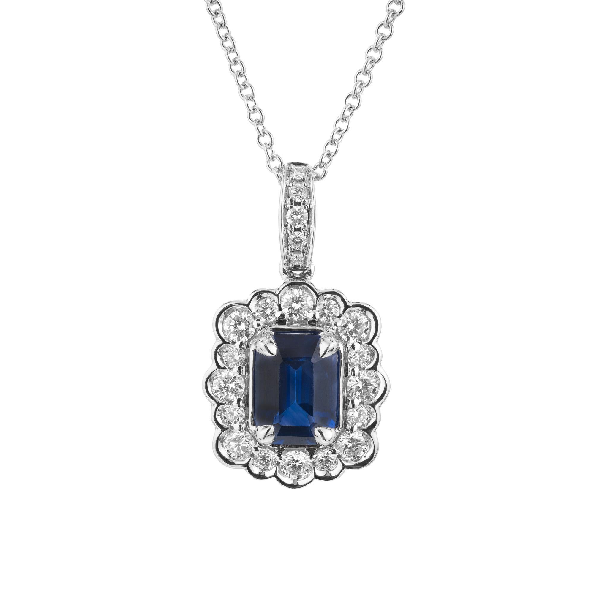 Peter Suchy GIA certified 1.29 Carat Sapphire Diamond Gold Pendant Necklace. This exquisite necklace showcases a stunning deep blue octagonal 1.29ct sapphire center stone, certified by the GIA as simple heat only. The vibrant and rich blue sapphire
