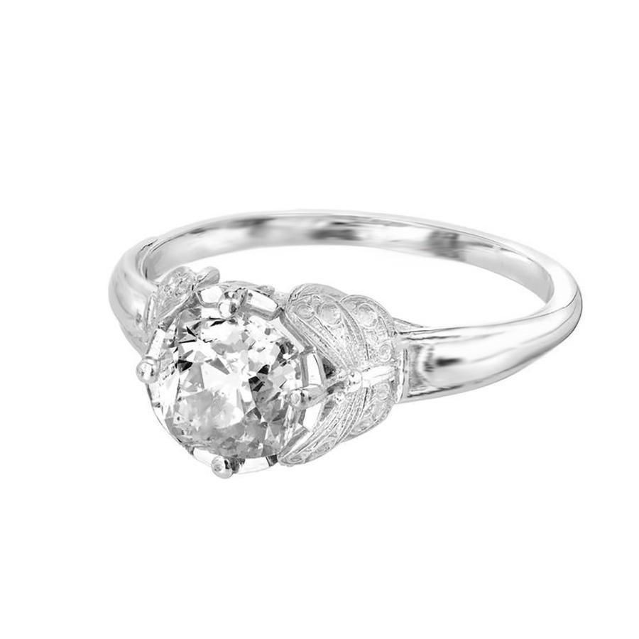 Peter Suchy Art Nouveau inspired diamond platinum Platinum engagement ring. The center Diamond is old mine brilliant cut 1.32ct Diamond, GIA certified as L, faint yellow mounted in a platinum Butterfly design setting. Designed and crafted in the