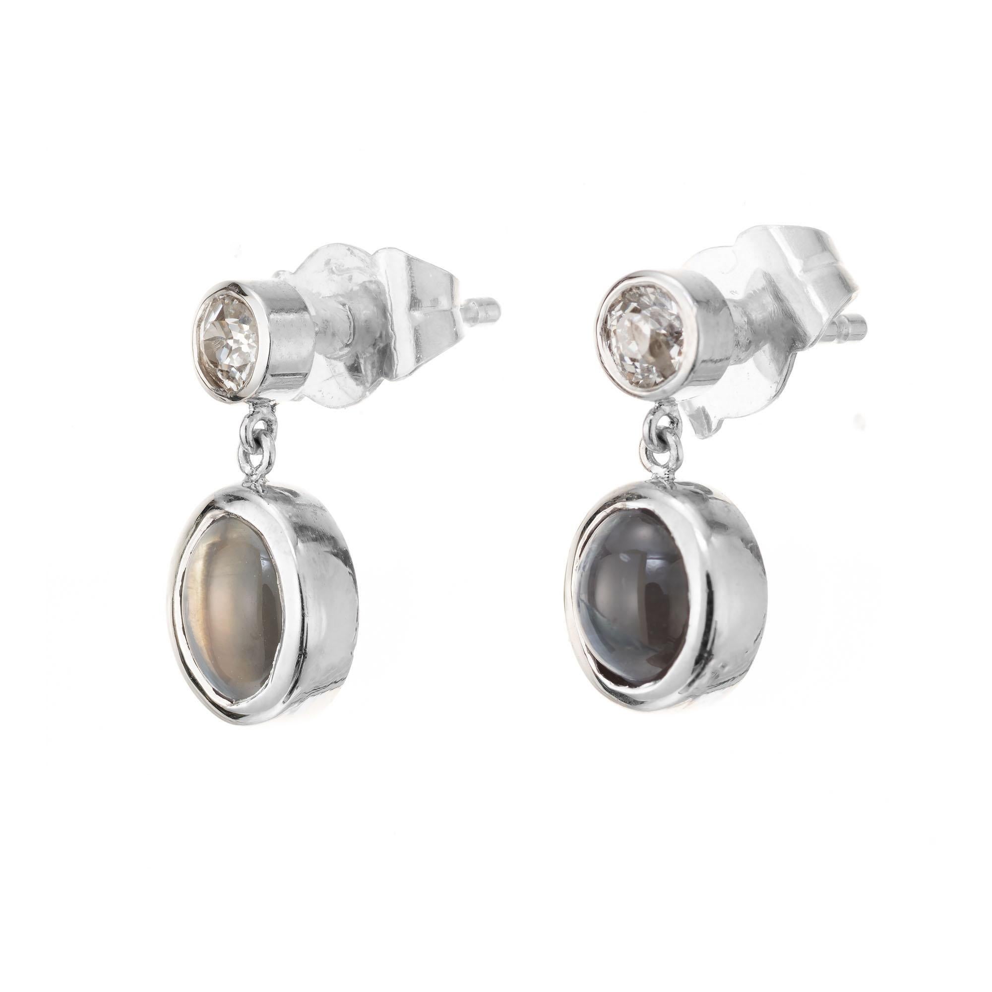 Petite cats-eye alexandrite and old mine cut diamond handmade platinum dangle earrings. GIA certified oval alexandrite stones with 2 round old mine cut accent diamonds. The stones are form an estate circa 1880-1890. Designed and created in the Peter