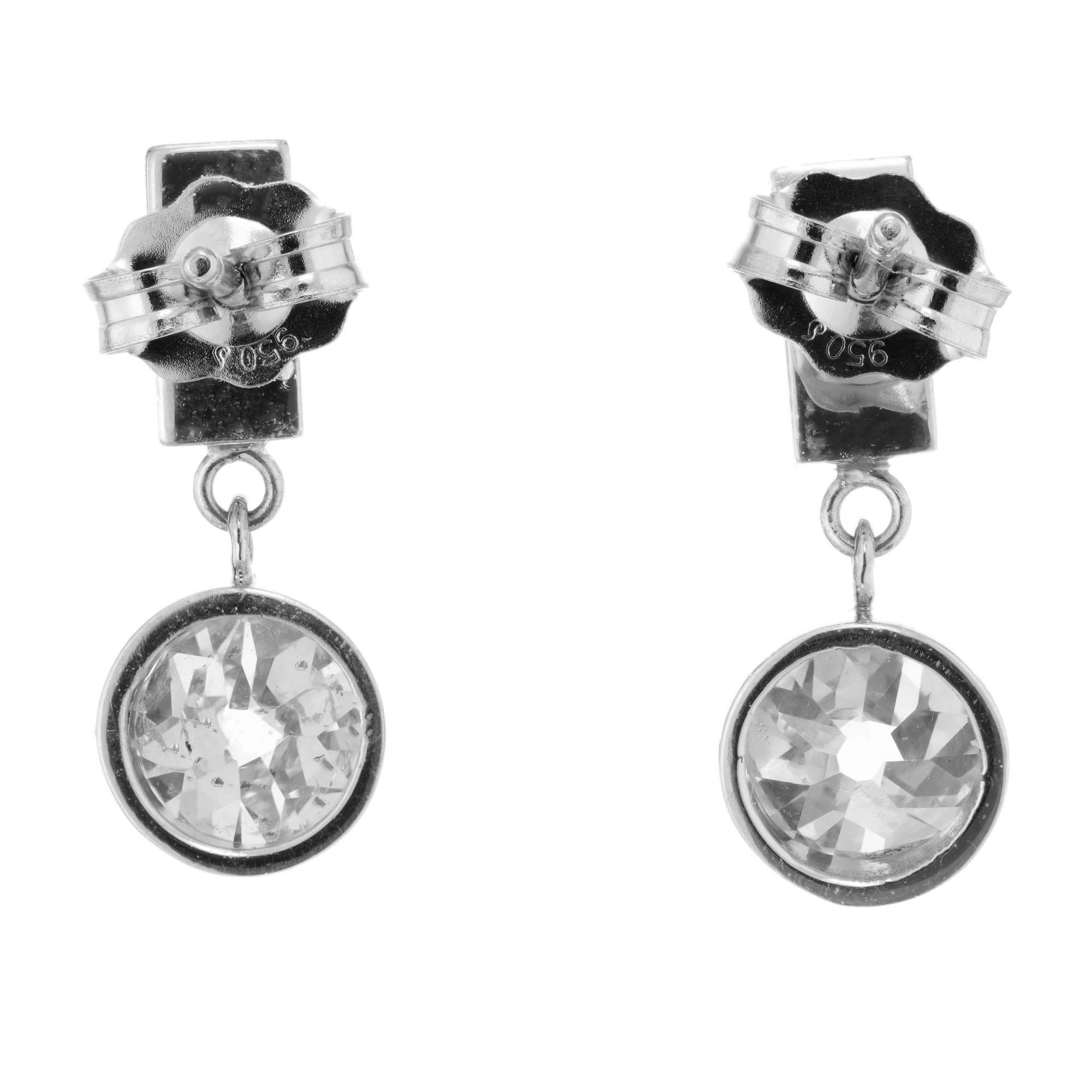 Art Deco revival Diamond dangle earrings. 2 Old Mine brilliant cut diamonds set in Platinum that dangle below 2 emerald cut accent diamonds. GIA certified. Designed and crafted in the Peter Suchy workshop.

2 emerald cut diamonds, H VS approx.