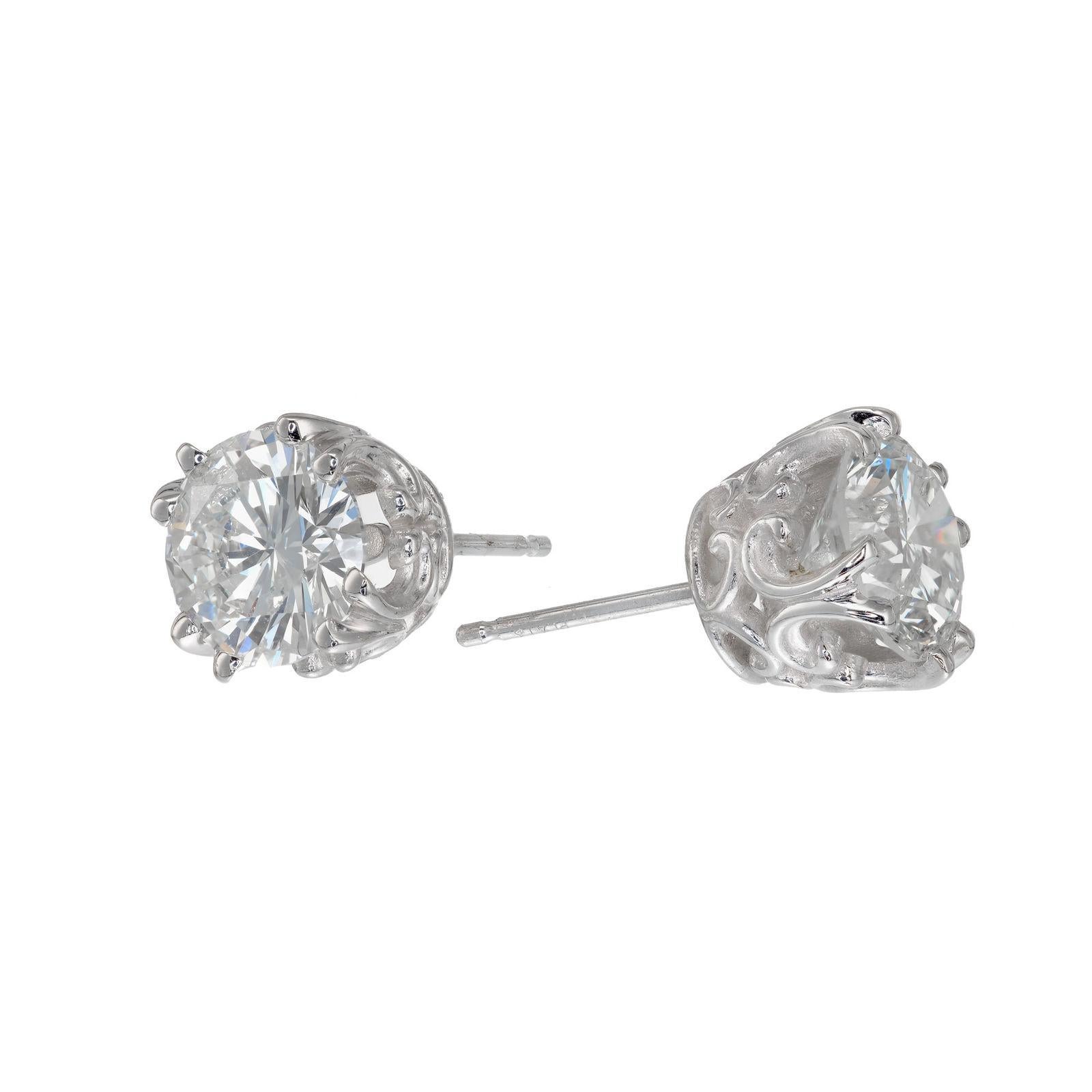 GIA Certified round diamond stud earrings. 1.46ct Diamond stud earrings set in platinum baskets, crafted in the Peter Suchy Workshop.

1 Round Brilliant Cut Diamond, 5.75-5.82 X 3.53mm, 0.73ct, I Color, VS2 Clarity, GIA Certificate # 6193681420
1