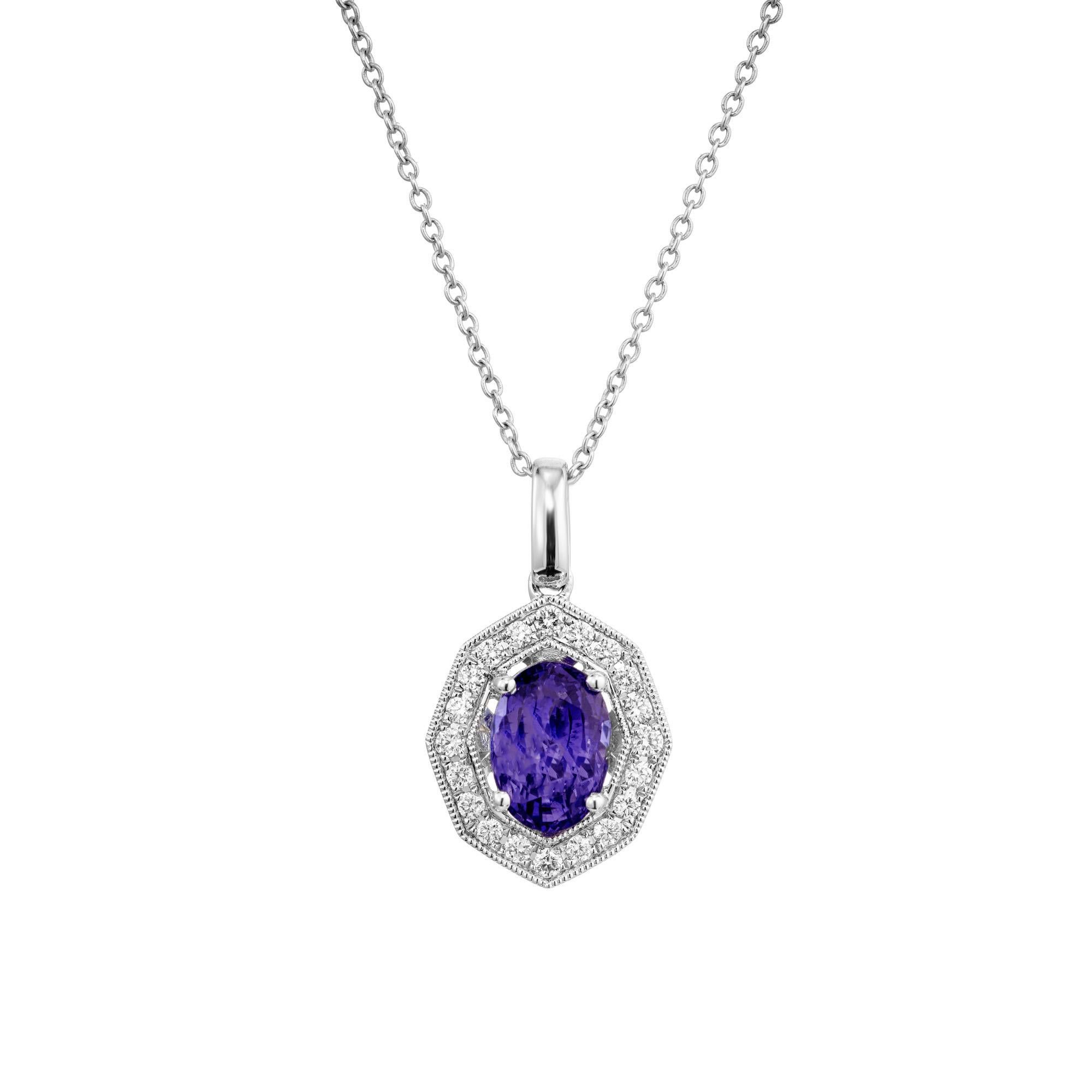 Beautiful and natural untreated sapphire and diamond pedant necklace. 1.47 carat oval sapphire mounted in a 14k white gold setting with a halo of 20 round brilliant cut diamonds. The GIA has certified the sapphire as a natural, no heat gemstone the