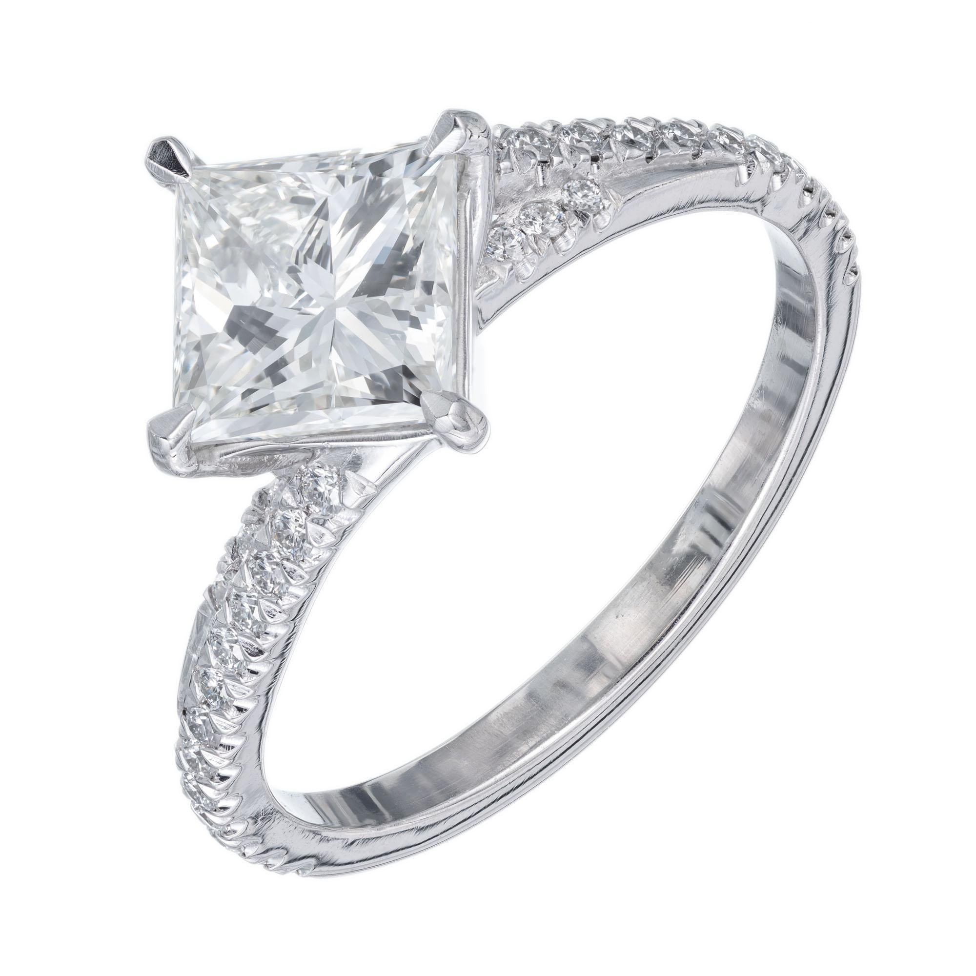 GIA certified Peter Suchy princess cut diamond 1.51 carat alternative twist style platinum engagement ring. Princess cut center stone with 32 round accent diamonds in a platinum setting created by the Peter Suchy Workshop. 

1 princess cut diamond J