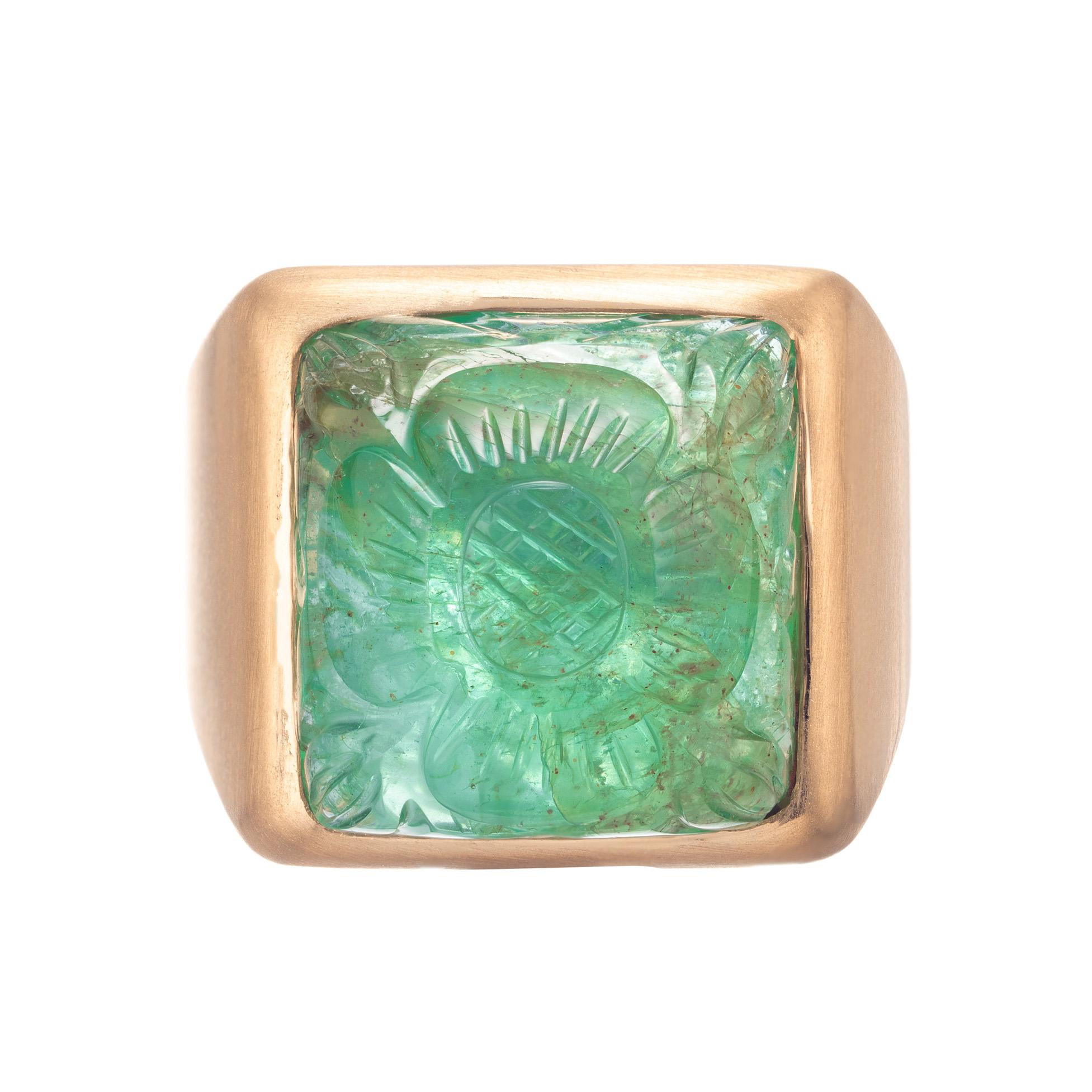 Emerald yellow gold ring. GIA certified natural emerald in a custom brushed dull finish 18k yellow gold ring from the Peter Suchy Workshop designed to show off the emerald

1 square carved green emerald, Approximate 15.92 carats, Gia certificate #