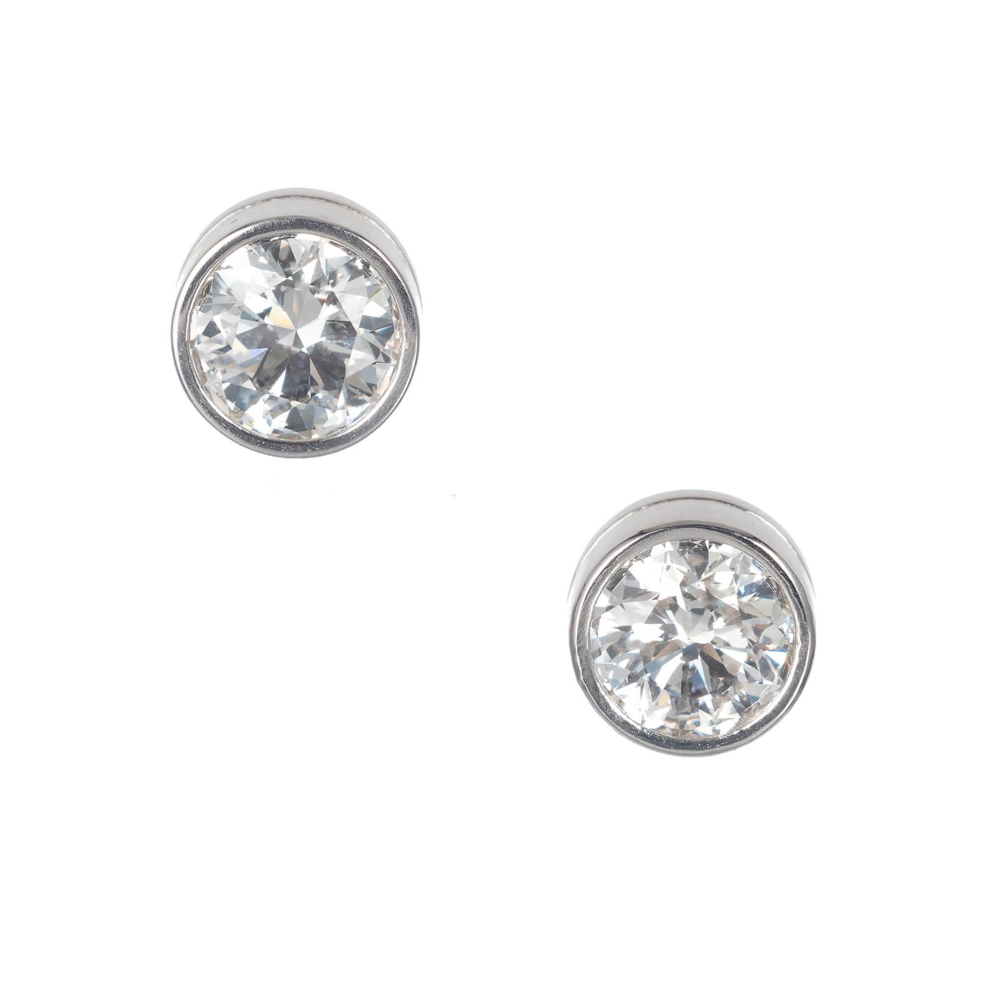 Peter Suchy Diamond Stud Earrings bezel set in platinum. Beautiful matched pair of bright sparkly Gia certified diamonds set in customized platinum bezels in the Peter Suchy workshop 

1 round brilliant cut I VVS2 diamonds, Approximate .83 carats.