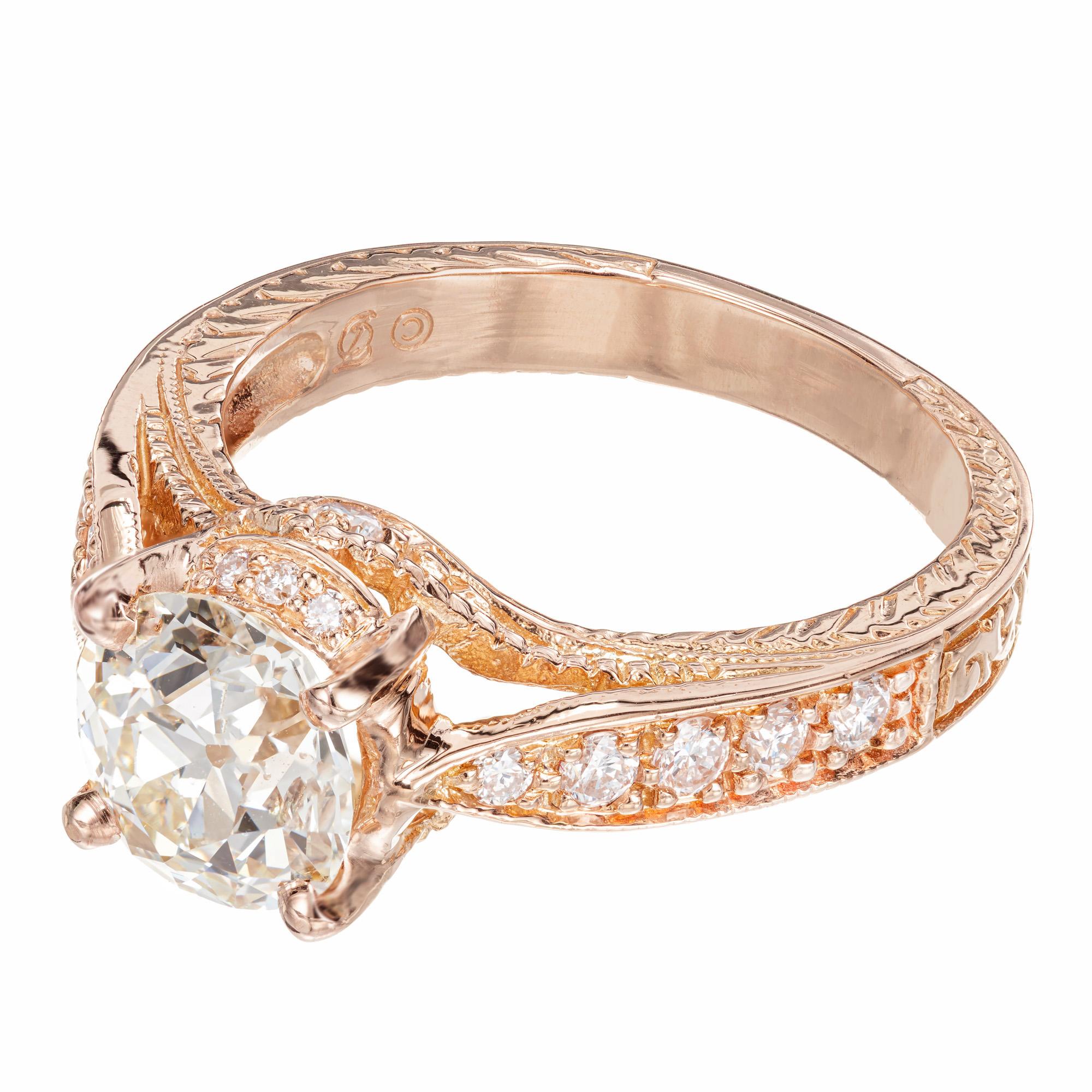 Old European brilliant cut diamond engagement ring. GIA certified center diamond with 18 brilliant cut accent diamonds in a 18k rose gold engraved setting created in the Peter Suchy Workshop. 

1 old European brilliant cut diamond M VS2, approx.