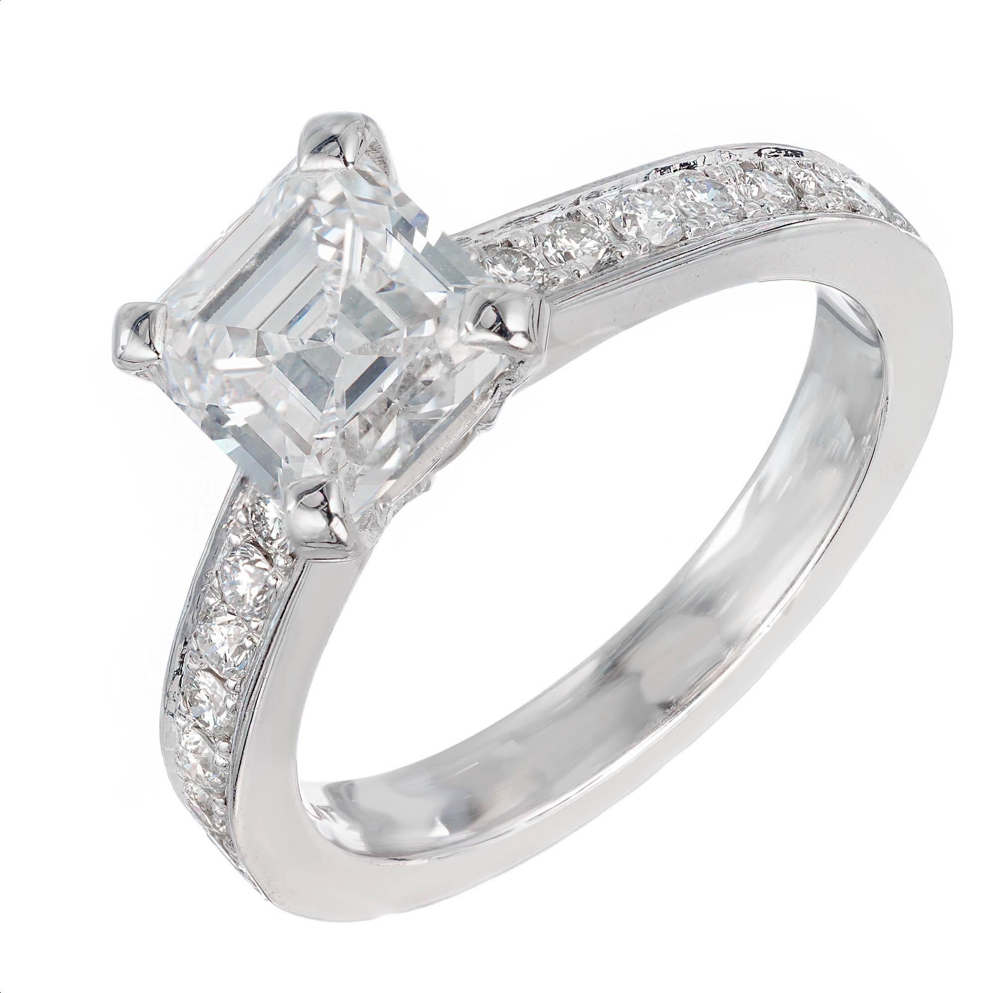 Peter Suchy diamond engagement ring. Extra sparkly asscher cut center diamond in a handmade platinum setting with 14 accent diamonds designed to show off the sparkle and beauty of the stone. 

1 Asscher cut E VS1 diamond, Approximate 1.83 carats.