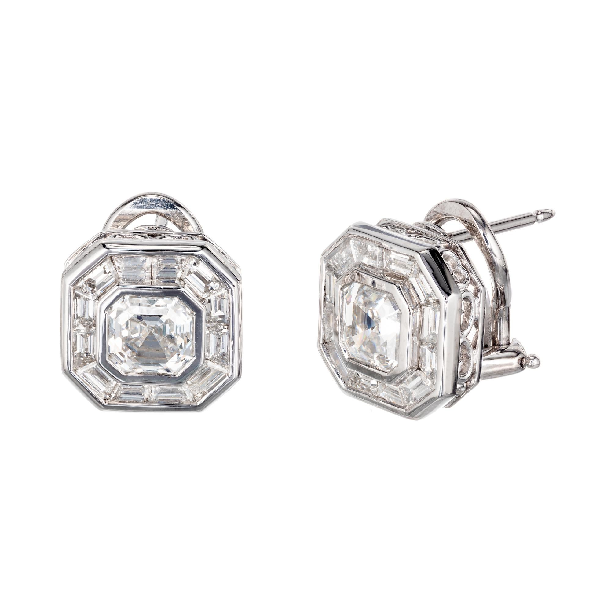 Peter Suchy Art Deco style diamond platinum clip post earrings. Asscher cut center stones from a 1920'a estate, with baguette halo diamonds in a clip post platinum setting.   Both diamonds are GIA Certified. The earrings were designed in the Peter