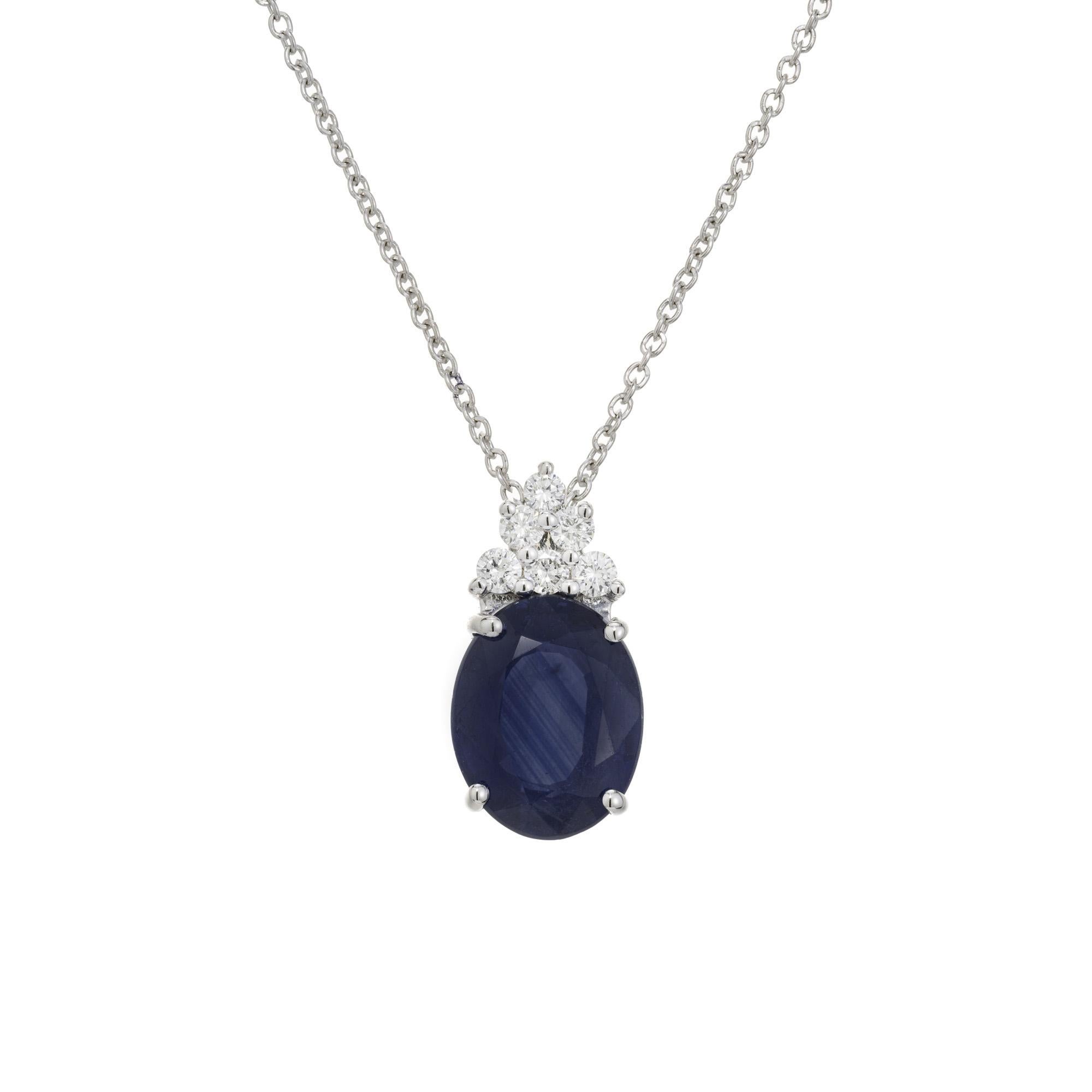 Sapphire and diamond pendant necklace. This 2.67ct oval sapphire is mounted in a 14k white gold simple basket setting with 6 round brilliant cut accent diamonds on the bail. GIA certified it as simple heat only. 16 inch platinum chain. Designed and