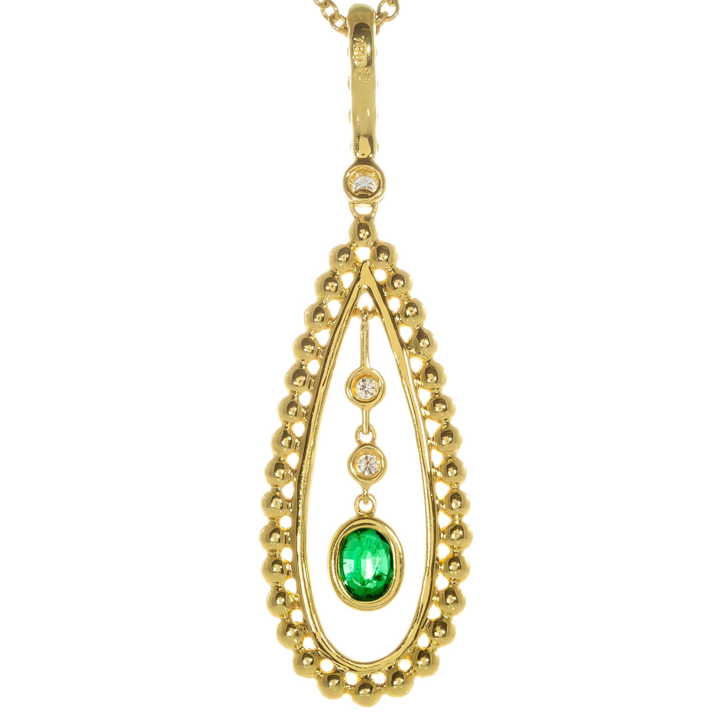Oval bright green emerald and diamond pendant. 18k yellow gold pendant with one center emerald and three round accent diamonds. Handmade in the Peter Suchy workshop. GIA certified natural emerald. minor clarity enhancement only. 
 
3 round diamonds