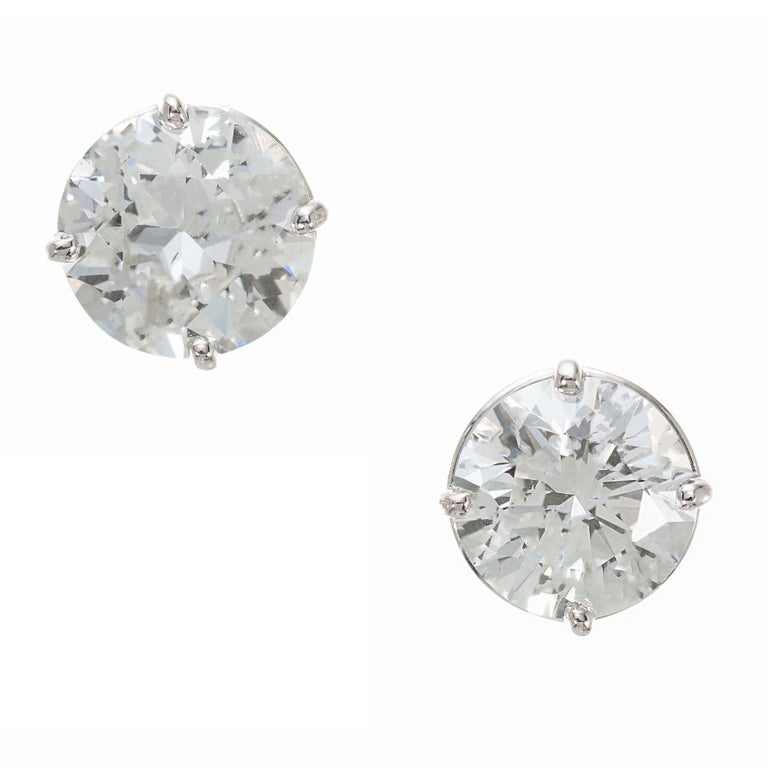 Diamond stud earrings. Well matched GIA certified brilliant cut diamonds in platinum 4 prong basket settings. Designed and crafted in the Peter Suchy workshop.

1 round brilliant cut diamonds, J SI approx. 1.55cts GIA Certificate # 5211046564
1
