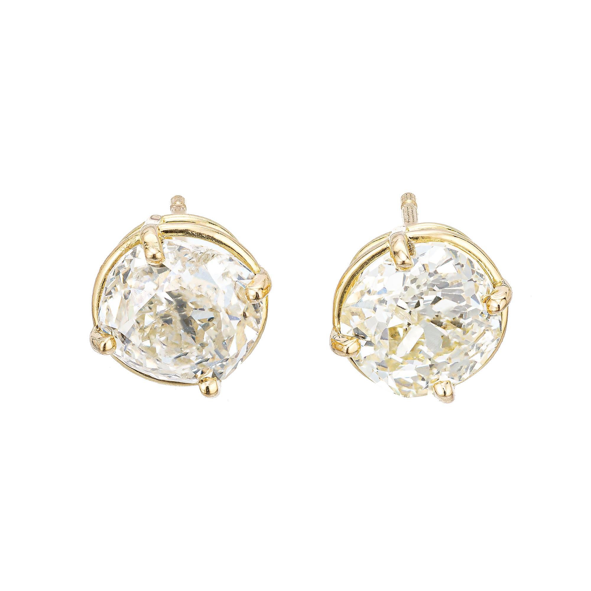Original old mine cushion cut diamond stud earrings. GIA certified diamonds circa 1880. Set in new 18k yellow gold classis basket setting. Designed and crafted in the Peter Suchy workshop.

1 old mine cut diamond , U-V SI2 approx. 1.57cts GIA