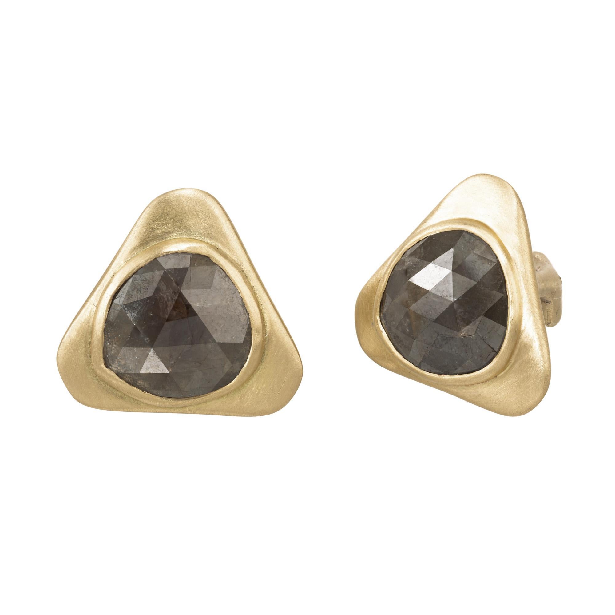 Step into luxury with the Peter Suchy GIA Certified 5.00ct rose cut diamond yellow gold earrings. These exquisite earrings feature two round rose cut translucent gray and brown bezel set diamonds with an approximate total weight of 5.00cts.
