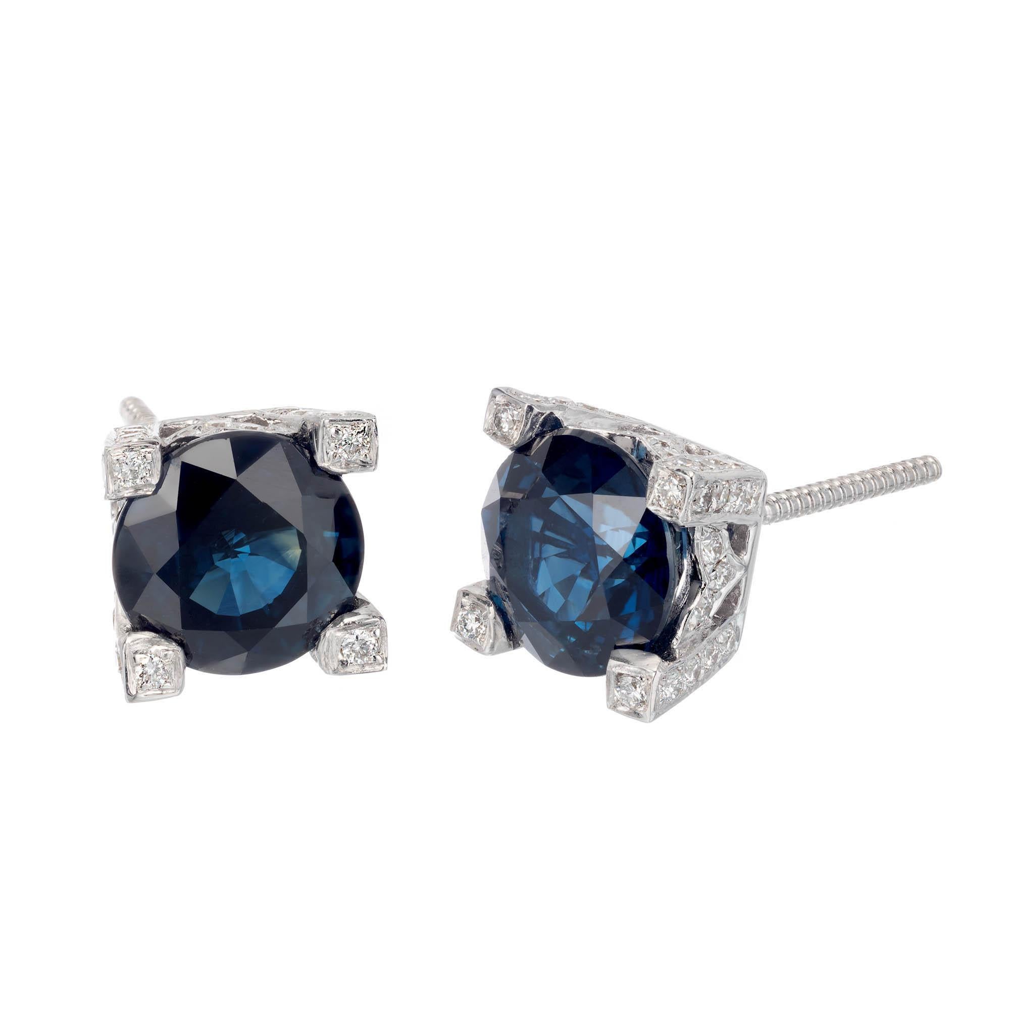 5.02 Carat royal blue natural no heat sapphire stud earrings. Gia certified 2.47 and 2.55 carat random tested. Sapphires are set in micro pave 18k white gold screw back baskets earrings, crafted in the Peter Suchy Workshop. 

2 round brilliant cut