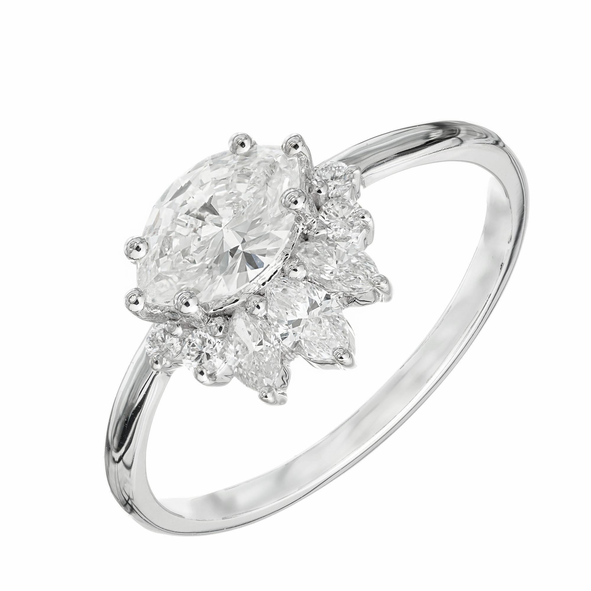 Tiara design alternative diamond engagement ring. GIA certified marquise diamond with marquise and round diamond halo in a 18k white gold setting. Designed and crafted in the Peter Suchy Workshop.

1 marquise shaped diamond, I SI2 approx. .70cts GIA