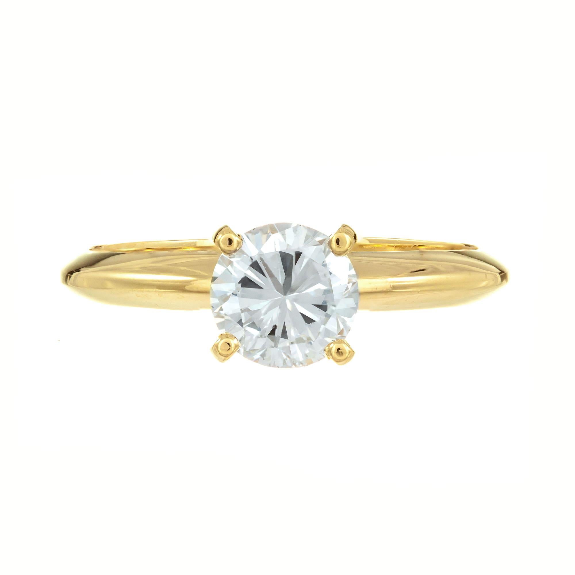 .77 carat transitional cut diamond engagement ring. GIA certified center diamond in a 14k yellow gold solitaire setting, created in the Peter Suchy workshop.

1 round brilliant cut diamond G SI2, approx. .77ct GIA Certificate #5201097300
Size 6 and