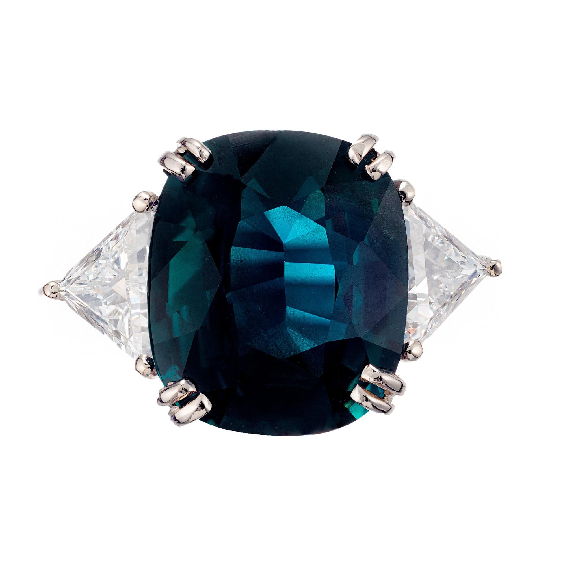 Teal green blue natural sapphire and diamond three-stone engagement ring. The sapphire is from a 1930's estate. Gia certified as no heat no enhancements. Platinum setting with tow trilliant cut side diamonds. Classic engagement ring from the Peter
