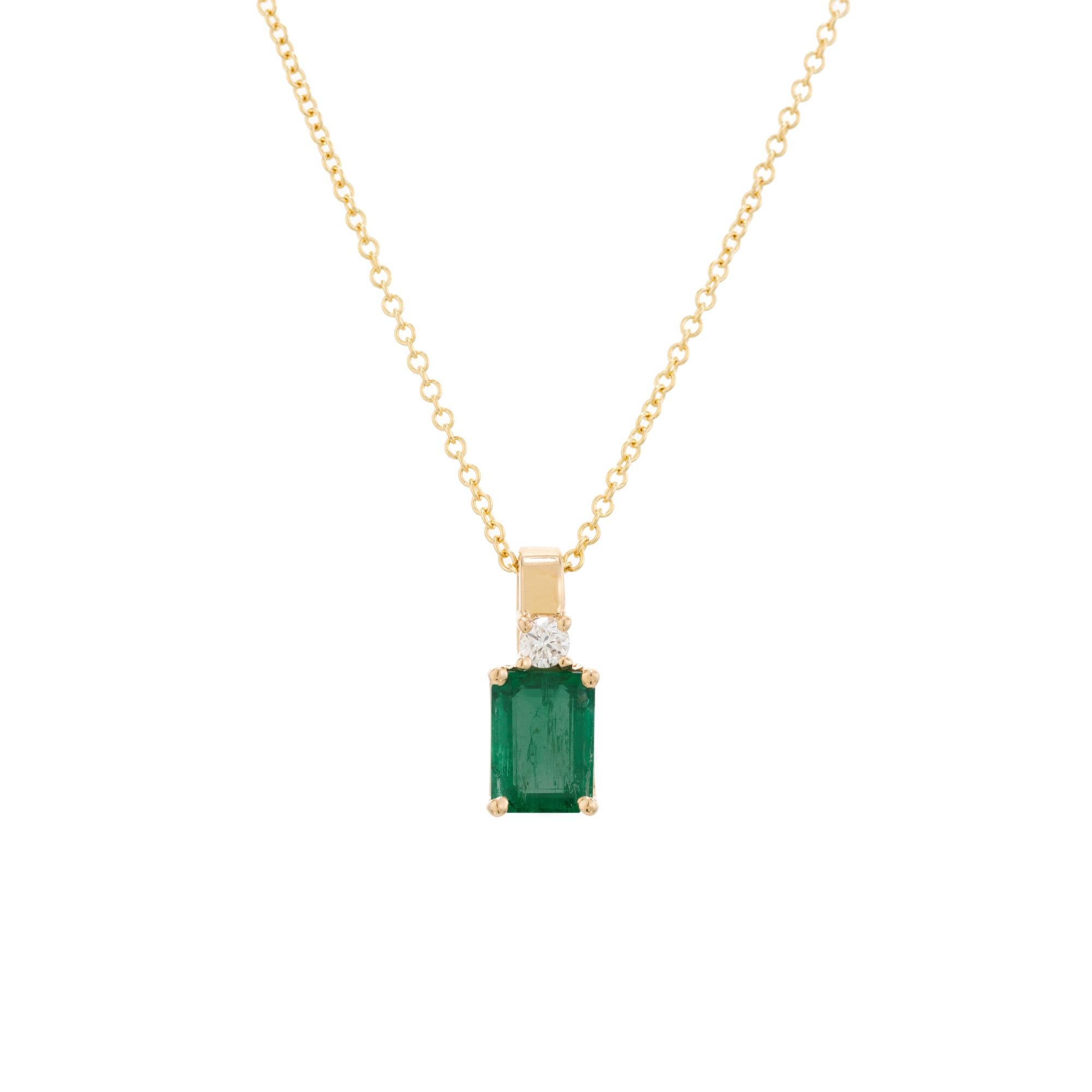 Crisp green emerald and diamond pendant necklace. GIA certified .81ct octagonal cut emerald set in a simple 4 prong 14k yellow gold setting accented with 1 round brilliant cut diamond .6cts.  An 18 inch 14k yellow gold chain completes this piece.