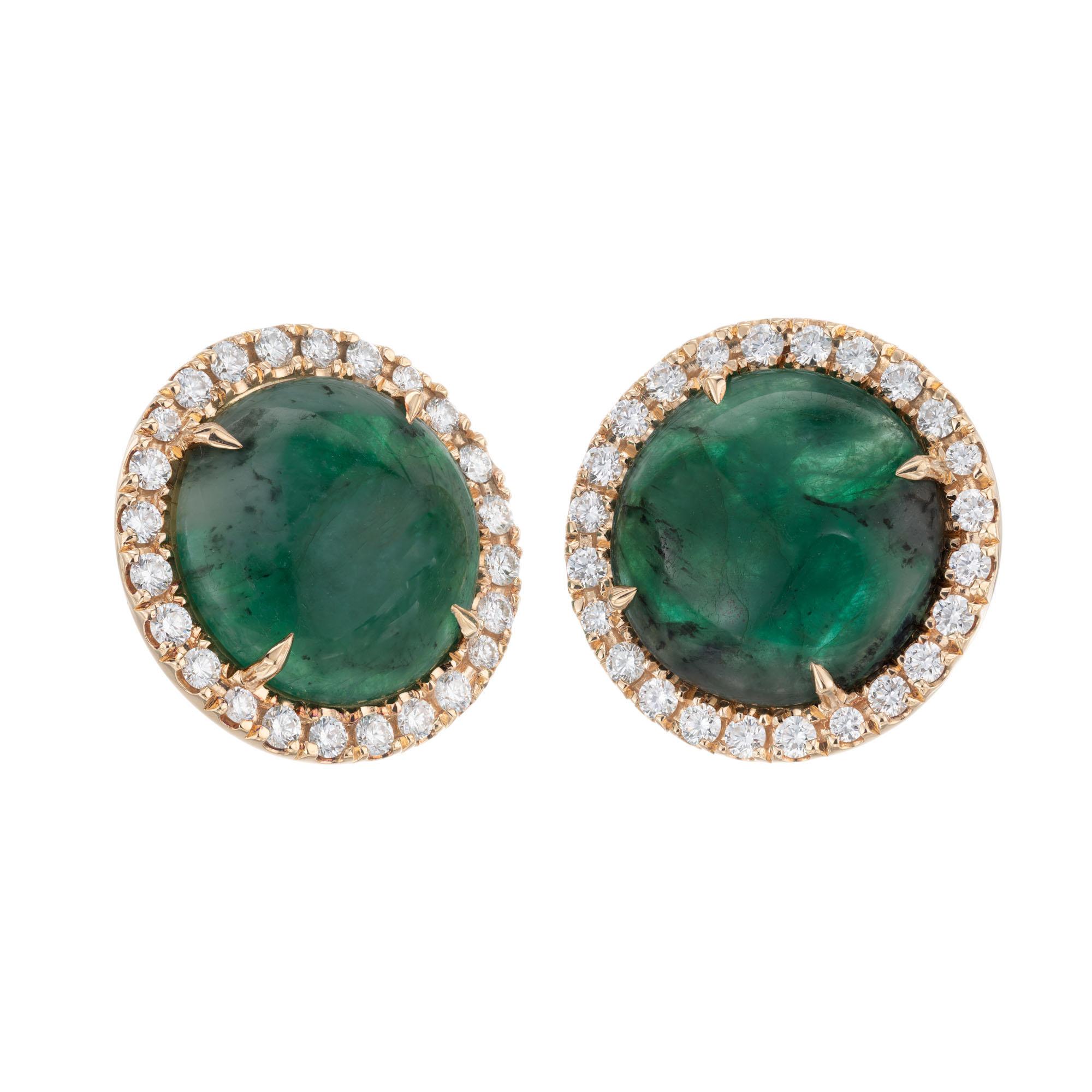 Round emerald and diamond earrings. GIA certified natural untreated round cabochon emeralds. (one emerald tested at random) Each with a diamond halo of 24 round brilliant cut diamonds in 18k yellow gold. Created in the Peter Suchy Workshop. 

2