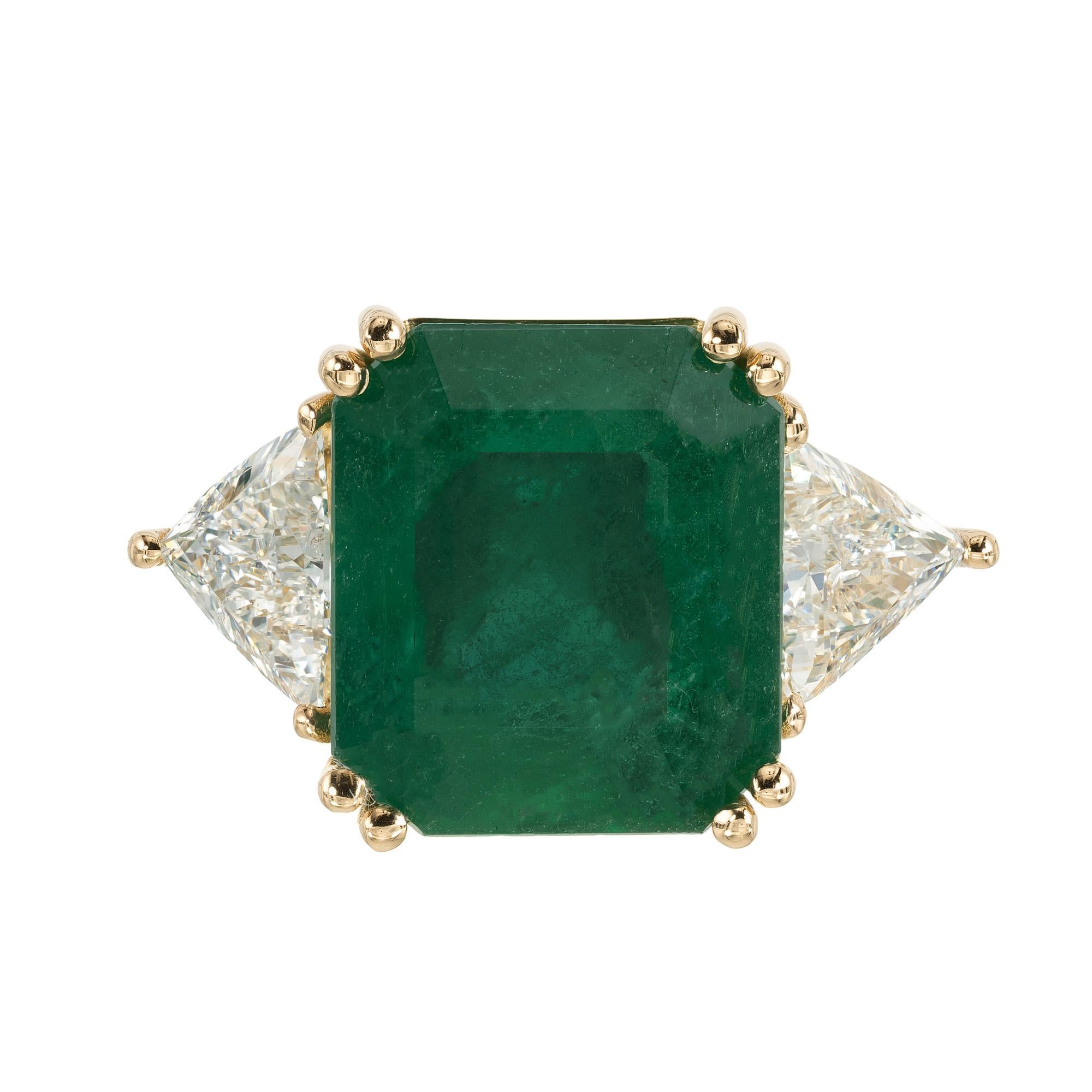 Introducing the Peter Suchy GIA Certified 8.99ct Emerald and Diamond yellow gold cocktail ring, masterpiece that transforms any occasion into a regal affair. This exquisite ring is a dazzling symphony of sophistication, featuring a breathtaking