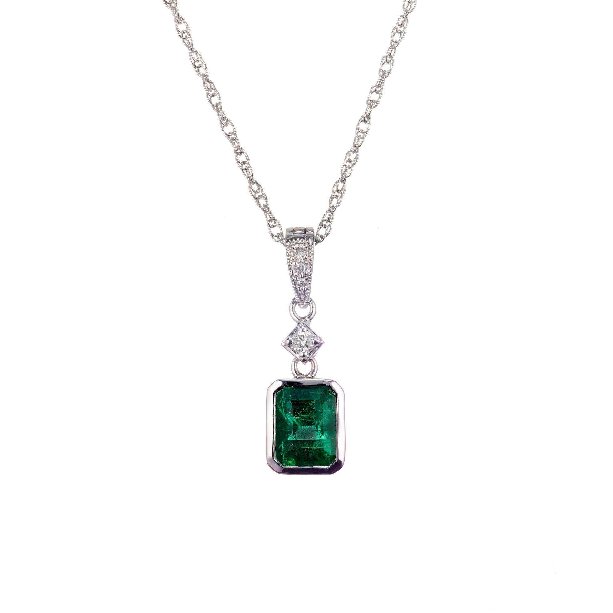 Peter Suchy bright green emerald and diamond pendant necklace. GIA certified natural emerald low level F clarity enhancement. Custom made bezel enhancer pendant with four accent diamonds. 14k white gold 16 inch chain. 

1 step cut octagon green MI