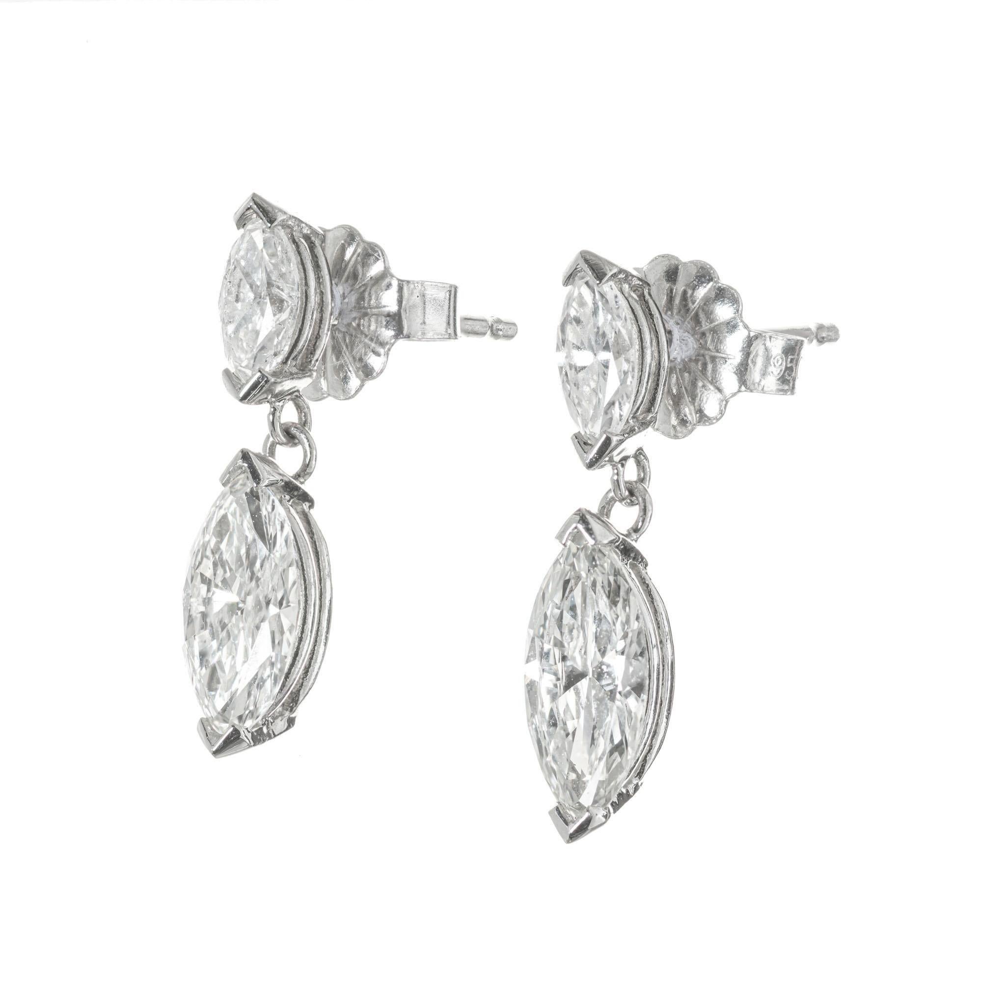 GIA Certified diamond dangle earrings. 2 GIA certified marquise cut Dimond dangles with 2 marquise cut top diamonds, set in platinum,. Created in the Peter Suchy Workshop.  The stones are from a 1950's estate.

1 marquise cut diamond, I VS approx.