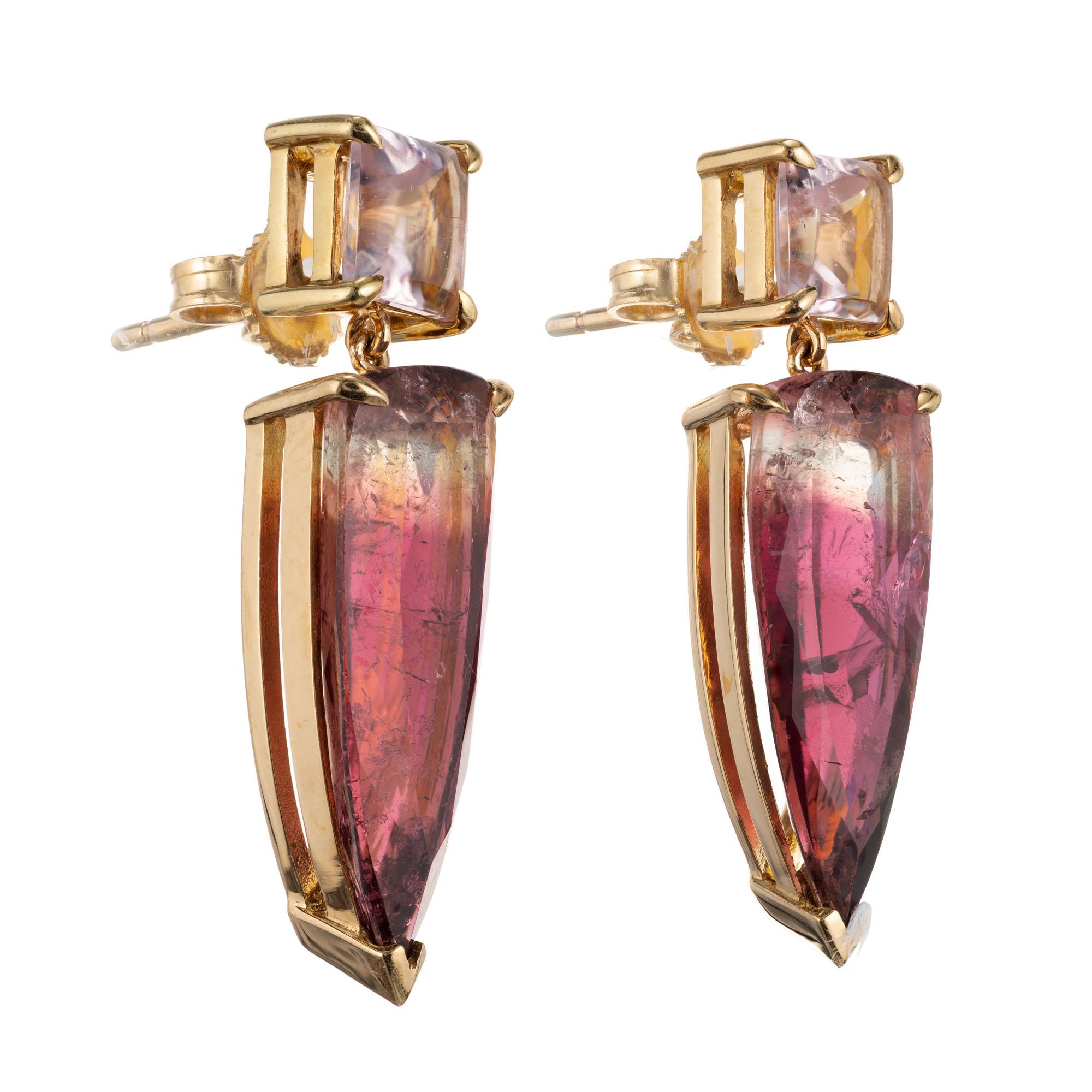 Soft pink, bi-color Tourmaline dangle earrings. 18k yellow gold handmade setting from the Peter Suchy Workshop.

2 square 5.8mm pink Tourmaline, approx. total weight, 2.00ct
2 bi color Tourmaline moderately included, approx. total weight 10.30cts,