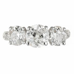 Peter Suchy Anillo de compromiso de platino con diamantes talla europea antigua de tres piedras