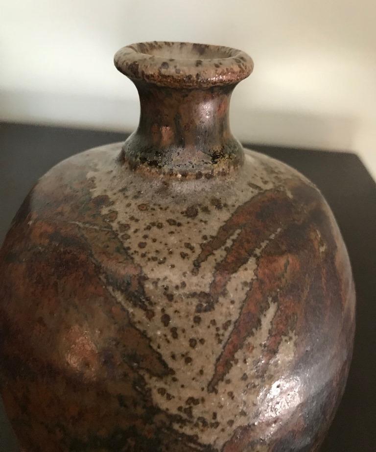 A fantastic early work (circa early 1950s) by Master Greek-American potter Peter Voulkos.

Signed on base with incised signature by Voulkos.

Voulkos is widely considered to be the most important and impactful ceramists of the modern era. He won
