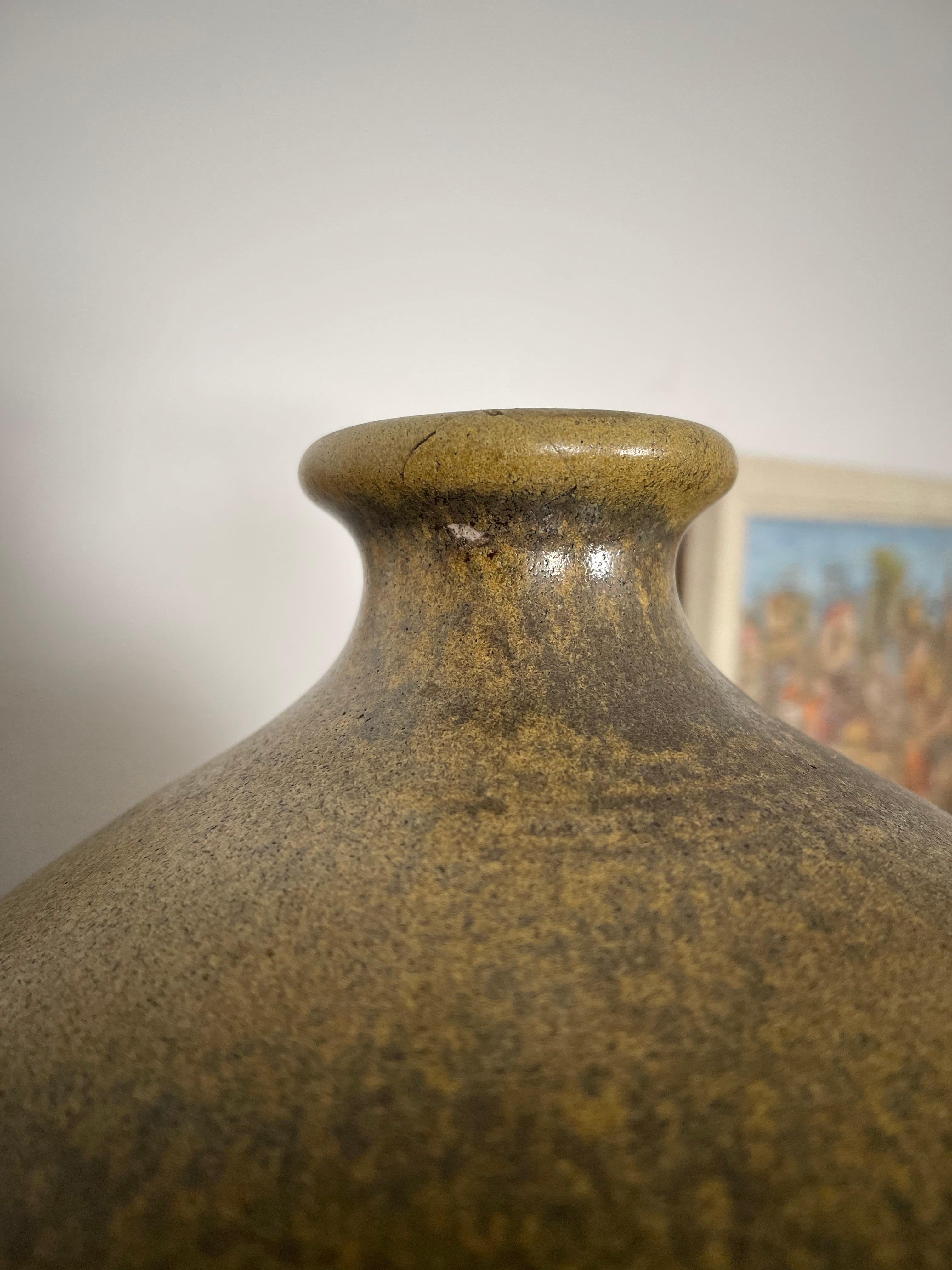 Mid century vase by Peter H. Voulkos, circa early 1950's.
This piece was made during Voulkos' time at the Archie Bray Foundation of the Ceramic Arts in Helena, Montana.
Vase features a spiral design on all four sides. Signed and stamped on the