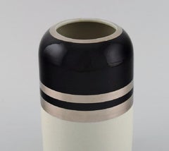 Peter Winquist for Arabia. Modernist vase in ceramics with silver decoration.