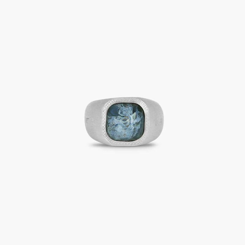 Petersite Signet Ring in Sterling Silver, Size XL

A cabochon of crystal quartz is rose-cut and placed on a slice of pietersite, cleverly combined to create a 'doublet', all expertly cut in Jaipur India. This unusual combination of semi-precious,