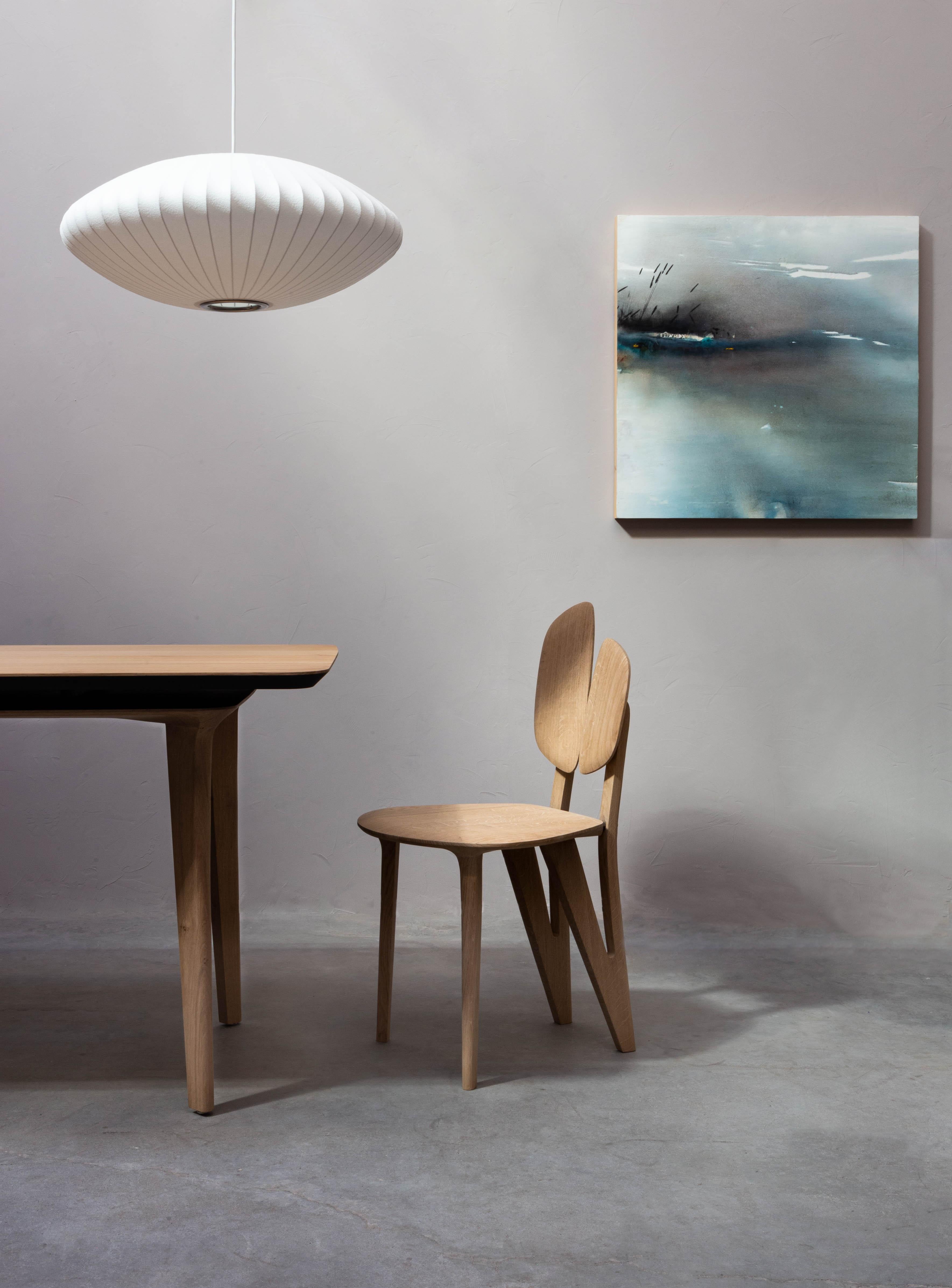 Pétiole chair in natural oak wood made by the designer Alexandre Labruyère. We offer the possibility to choose the color of the wood.

Dimensions: Total H 33.46? x20.07? x 17.71?

Alexandre Labruyère is a designer of contemporary furniture and