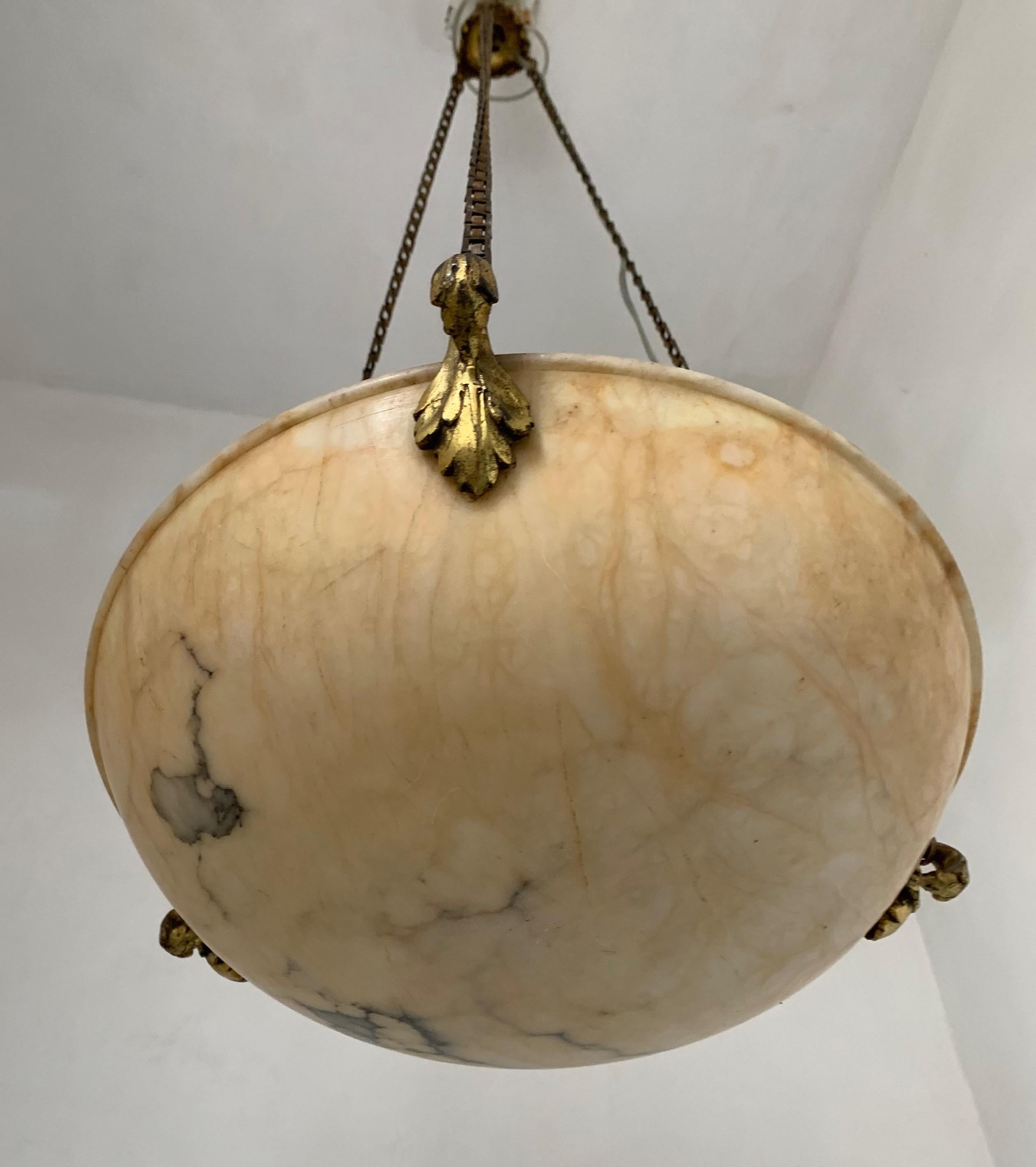 Great neoclassical design, rare color and excellent condition, French light fixture.

If you are looking for a stylish, timeless and small light to grace a small room in your living space then this antique alabaster fixture could be the one. All