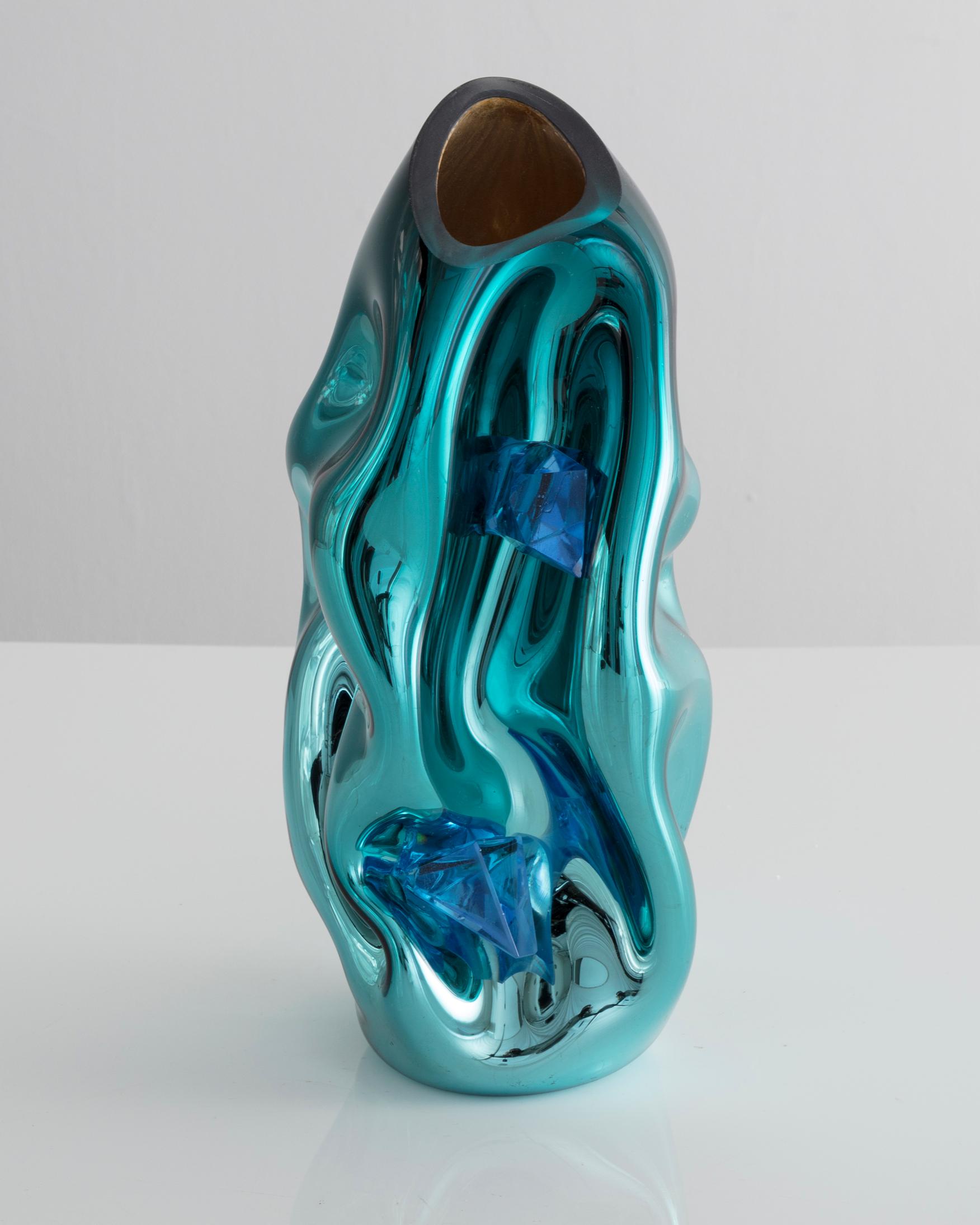 Unique petite crumpled sculptural vessel in silver and turquoise mirrorized hand blown glass with applied glass crystal. Designed and made by Jeff Zimmerman, USA, 2017.

Limited number available. Please note that each item may differ slightly in