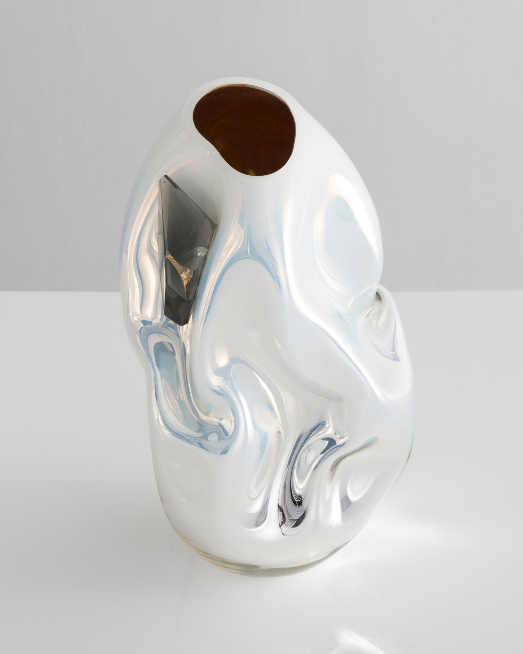Unique petite crumpled sculptural vessel in silver and white mirrorized hand blown glass with applied glass crystal. Designed and made by Jeff Zimmerman, USA, 2017.

Limited number available. Please note that each item may differ slightly in color