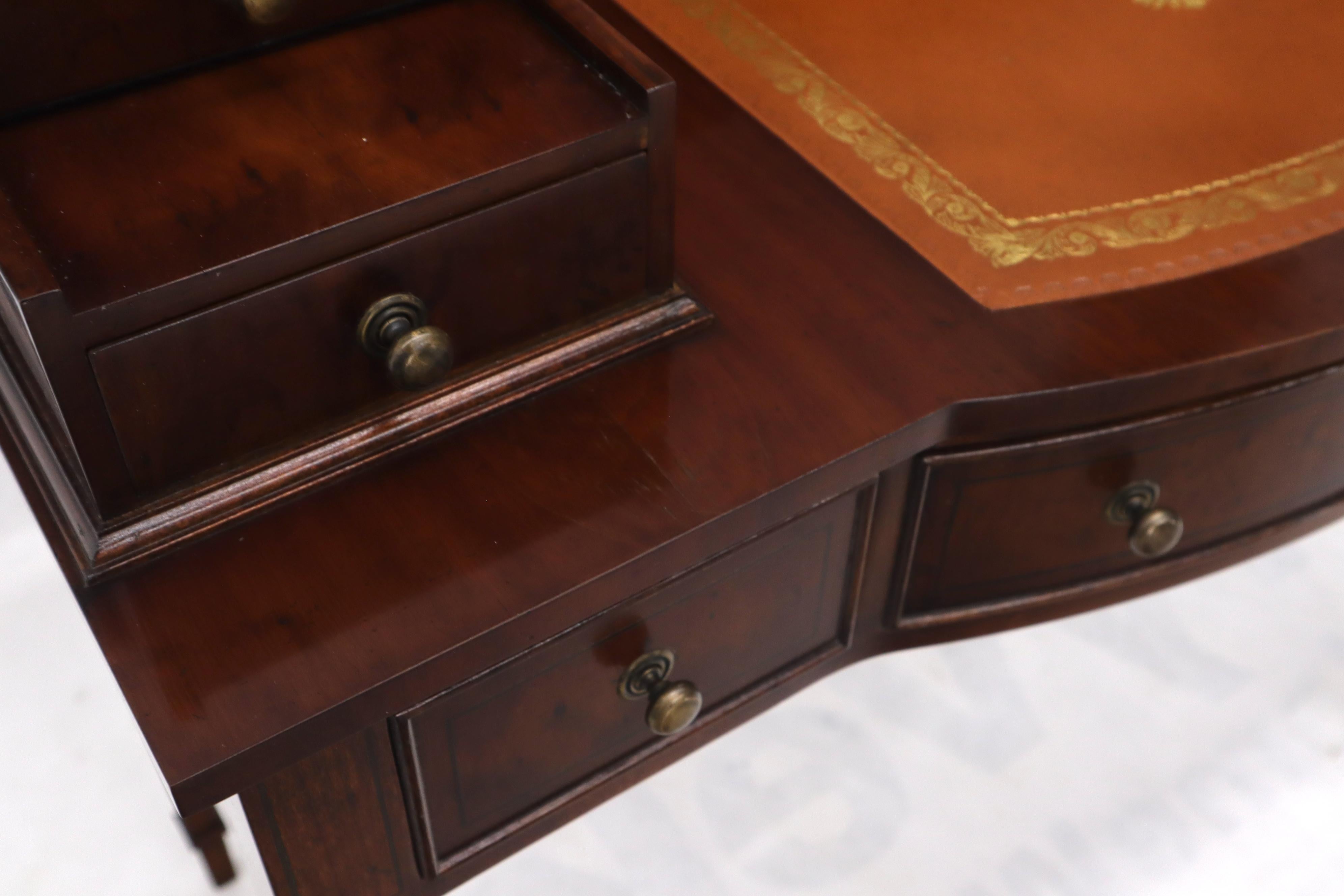 Lacquered Petit English Multi Drawer Compartment Mahogany Leather Top Desk For Sale