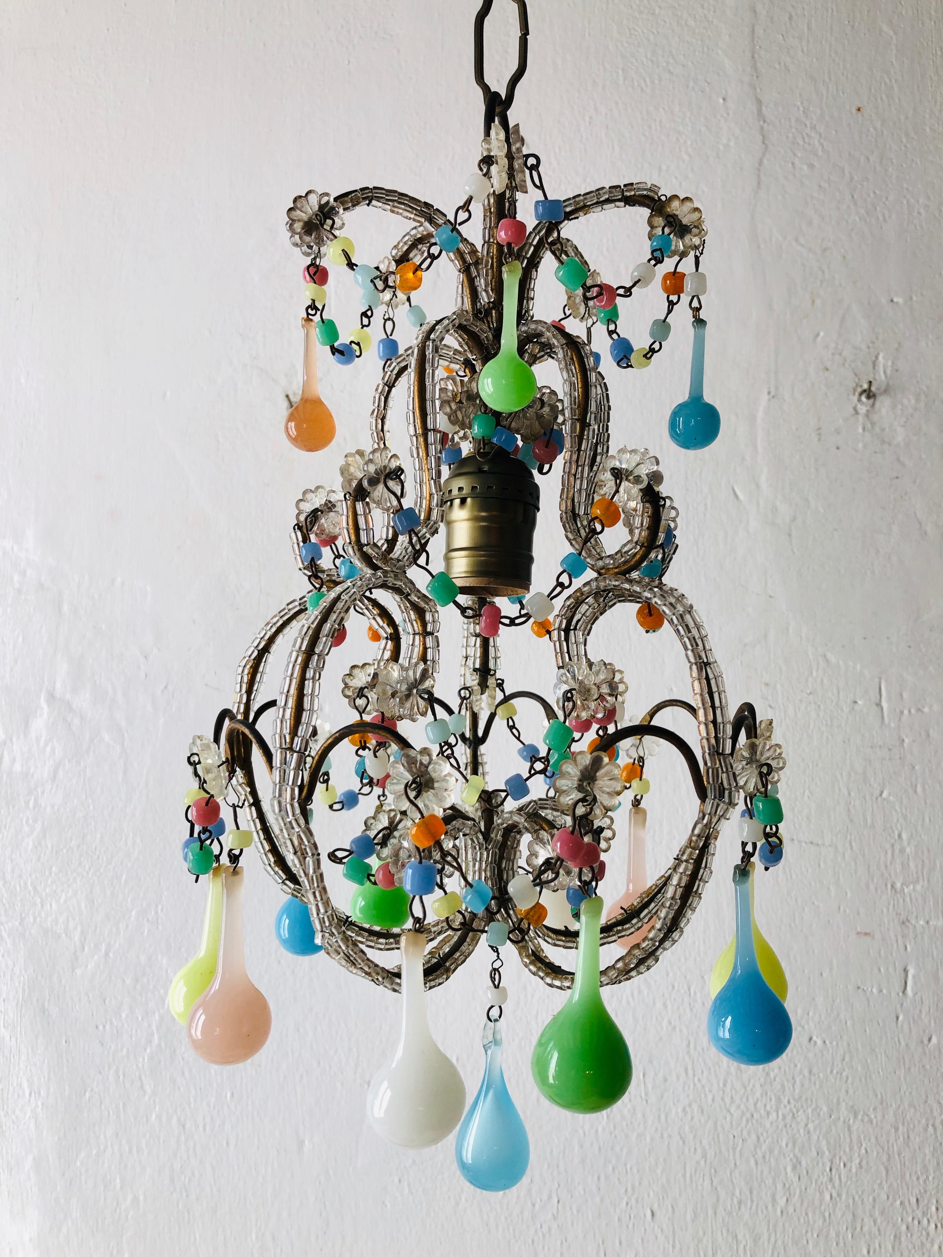 Housing one light in centre. Rewired and ready to hang. Double beading throughout. Adorning swags of opaline beads and 2 sizes of opaline drops in the colors of green, pink, blue, purple, white and yellow. Adding another 9 inches of original chain
