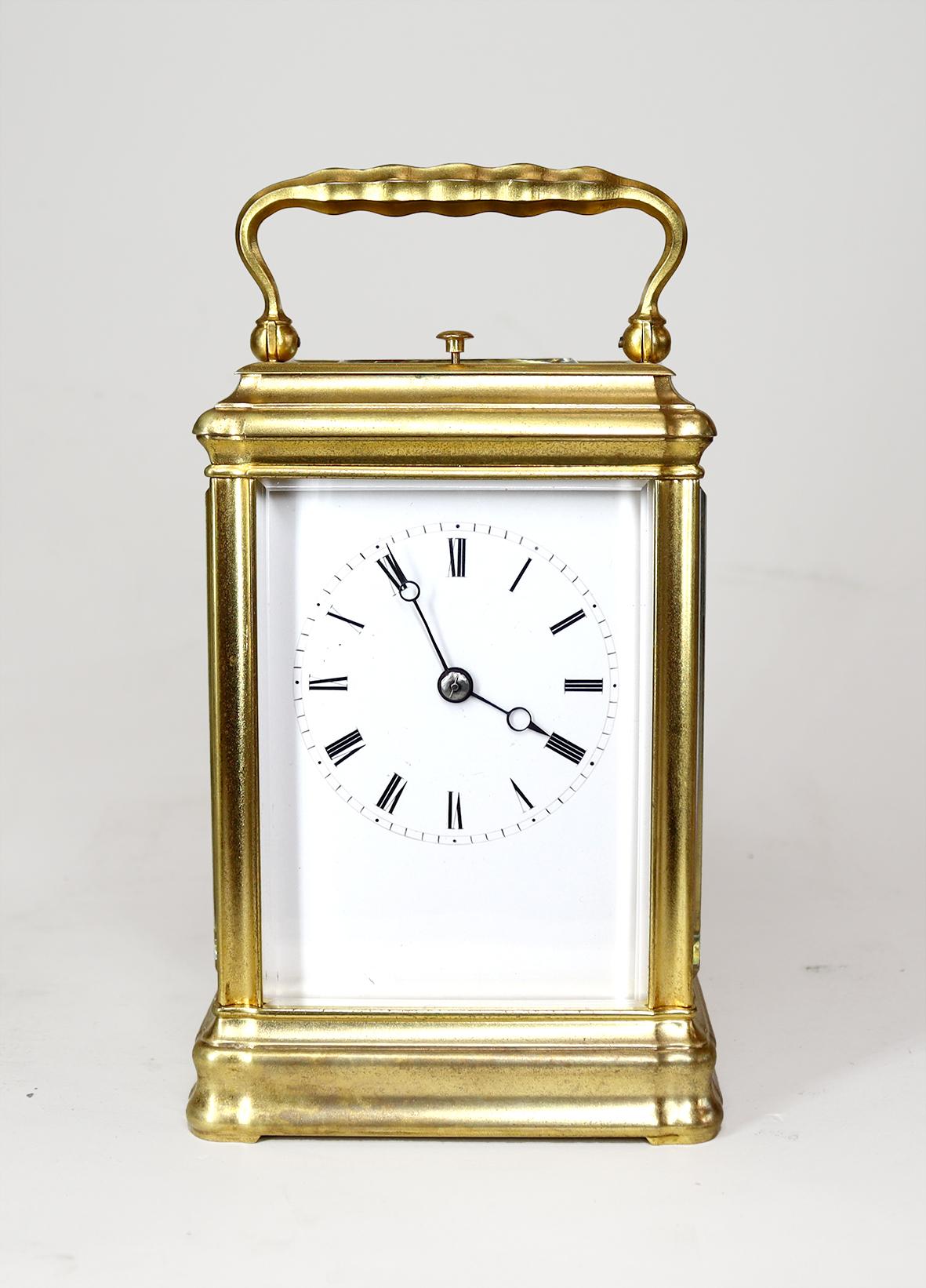 A handsome Petit Sonnerie Carriage clock in a Gorge case retaining much of its original gilding, the eight day movement with original silvered lever escapement, strikes on two nested bells, striking the hours on the larger bell and the quarters on